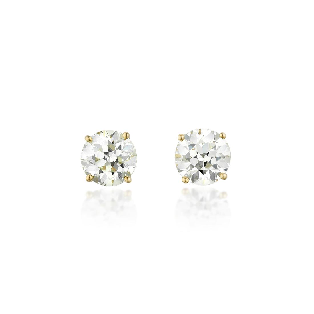 A Pair of Diamond Stud Earrings (1 of 2)