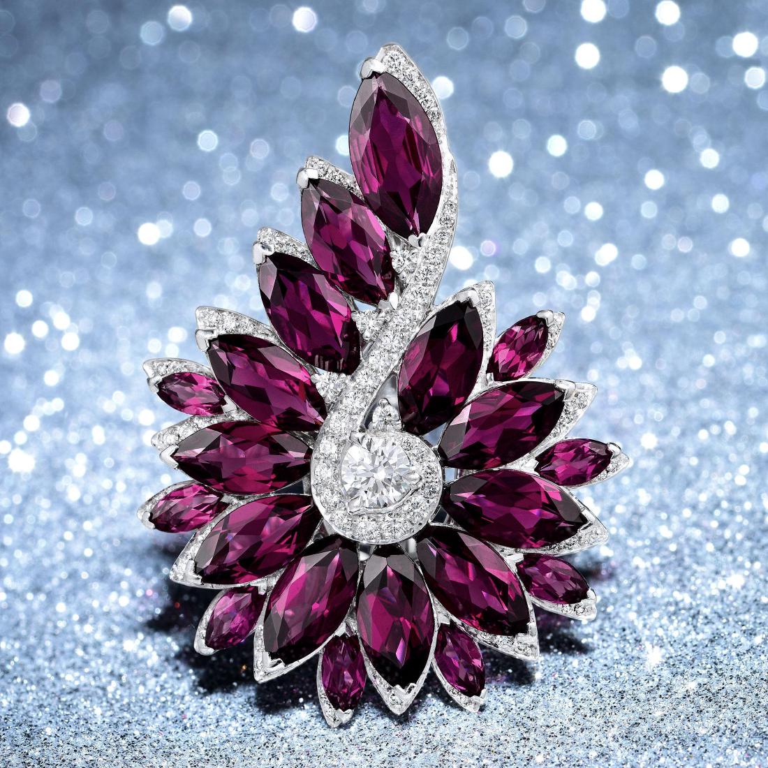 Stephen Webster Magnipheasant Rhodolite Garnet Platinum: Crafted in platinum; featuring 20 marquise-cut rhodolite garnets weighing a total of approximately 18.65 carats; accented with 77 round brilliant-cut diamonds weighing a total of approximately 1.35 ca
