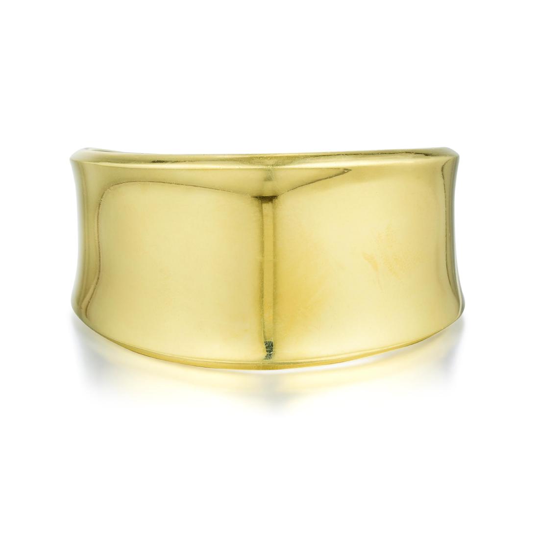 Robert Lee Morris Gold Bangle: Crafted in 18K gold; inner circumference 6-1/4 inches, width 1-1/4 inches at widest section, breach 3/4 inch; weight 56.30 g. Signed: Robert Lee Morris; Stamped: 18K PROPERTY OF A LADY