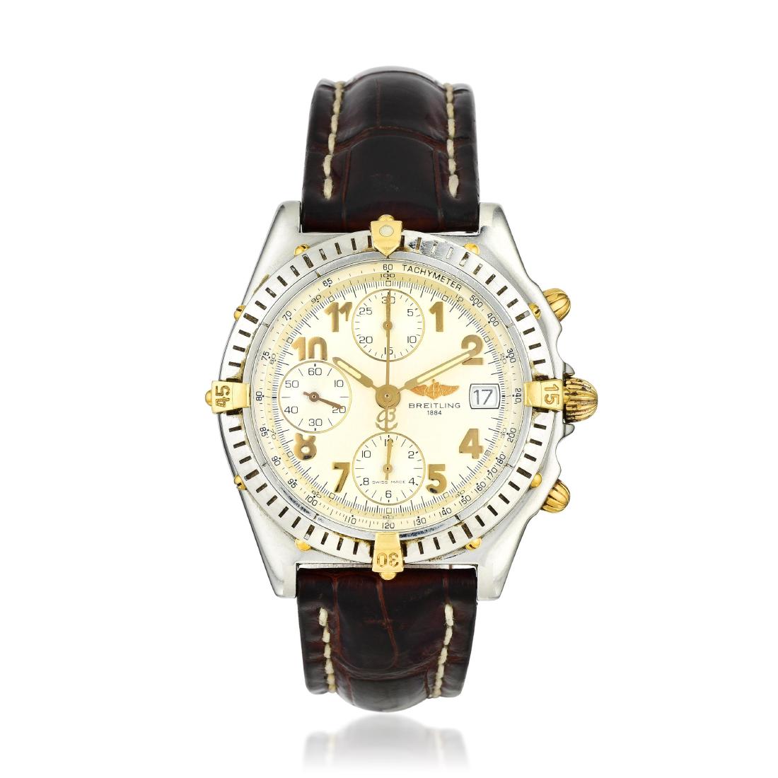Breitling Chronomat Ref. B13050.1 in 18K Gold and Steel: CIRCA: 1990s REF.: B13050.1 CASE MATERIAL: Stainless steel with 18K yellow gold accents CASE DIMENSIONS: 39.00 mm in diameter DIAL: Opaline white with applied gold Arabic hour markers, date aperture a