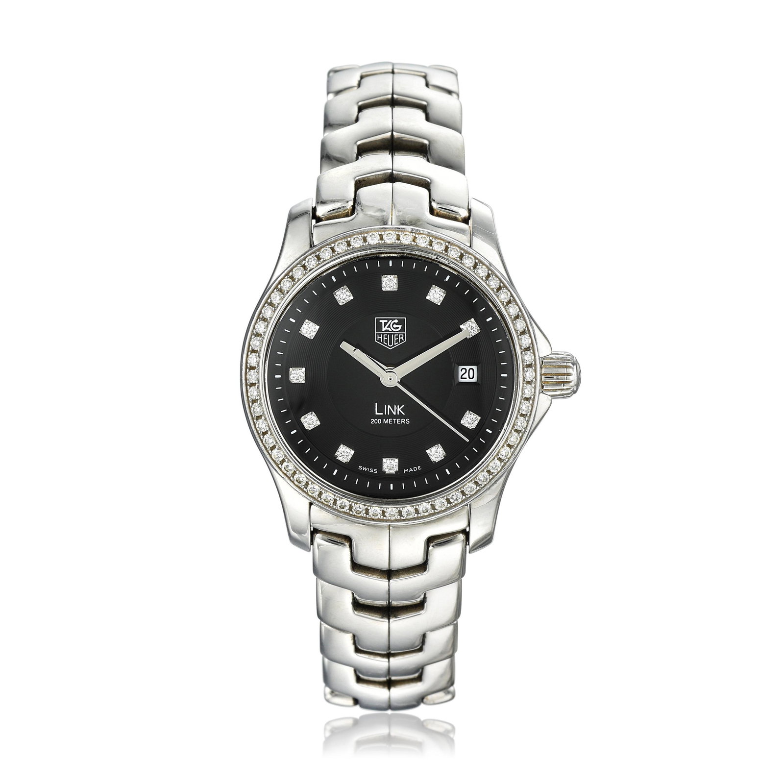 Tag Heuer Link Diamond Ladies Watch in Steel: CIRCA: 2000s REF.: WJF131A.BA0572 CASE NUMBER: VE3029 CASE MATERIAL: Stainless steel CASE DIMENSIONS: 27 mm in diameter DIAL: Black with diamond hour markers and date aperture at 3 o'clock. Diamond be
