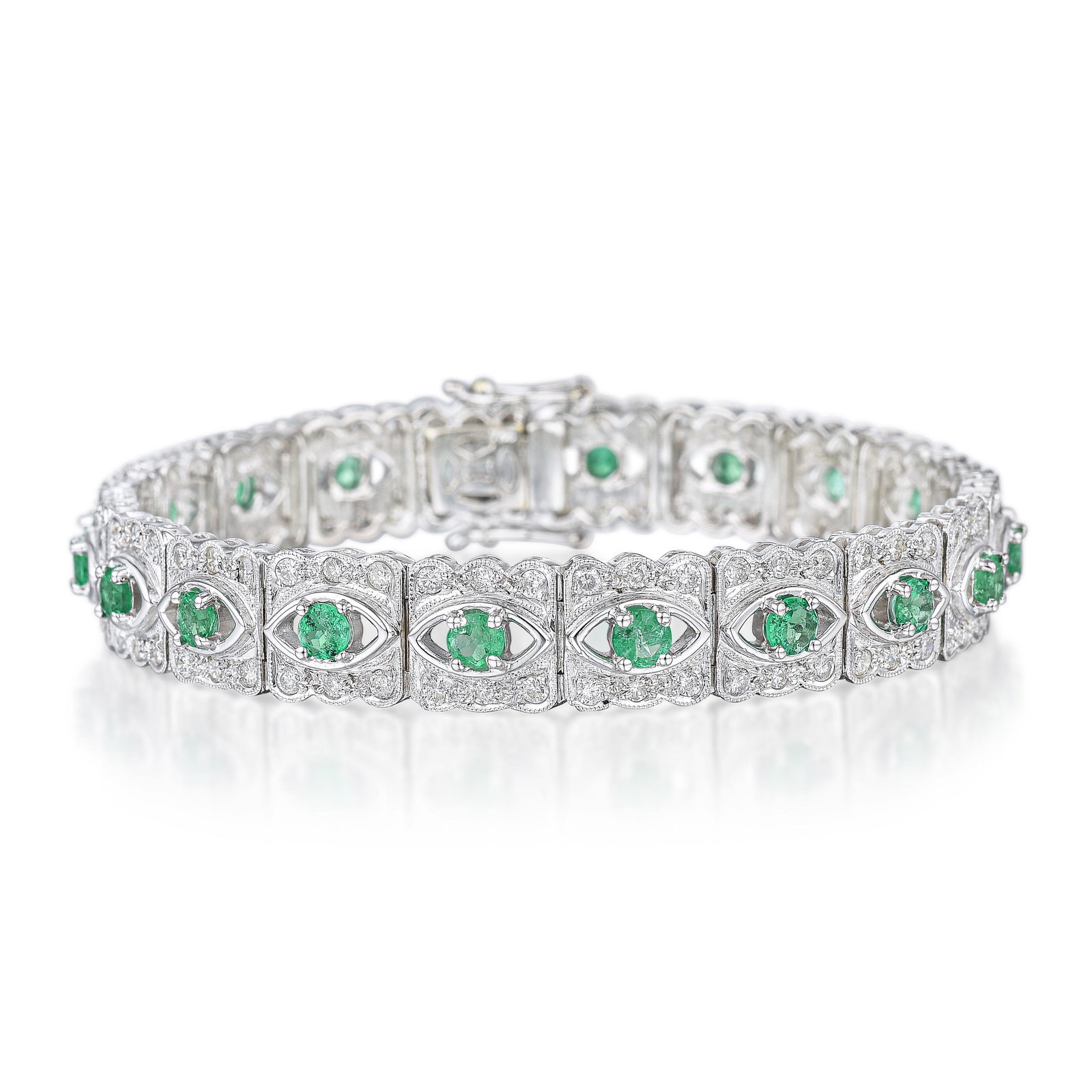 Emerald and Diamond Bracelet: View a video of this lot: Click Here Crafted in 18K white gold; set with round-cut emeralds, weighing a total of approximately 2.80 carats: accented by round brilliant-cut diamonds, we
