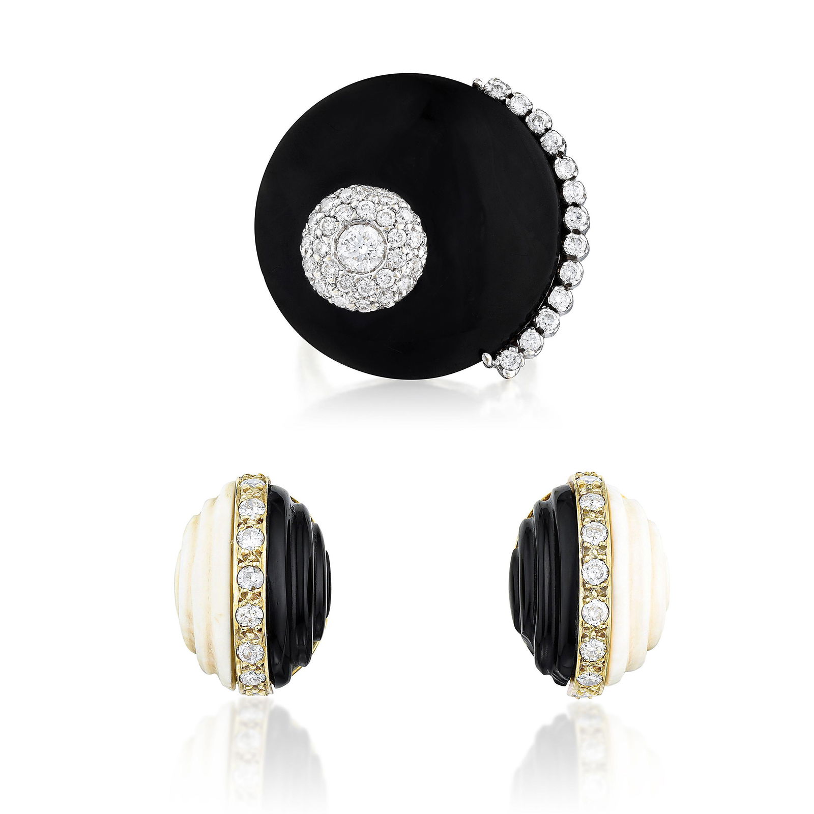 Onyx and Diamond Ring & White and Black and Diamond Ear: METAL: 18K white gold, 14K yellow gold GEMSTONE(S): round brilliant cut diamonds MEASUREMENTS: ring top 7/8 inches in diameter; earrings 5/8 x 1/2 inch RING SIZE: 5-1/2 WEIGHT: 18K 13.30 g., 14K 11.30