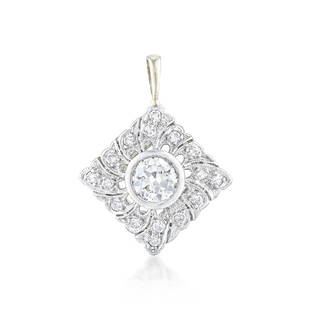 Diamond Pendant: METAL: platinum pendant and 14K white gold bail GEMSTONE(S): center circular brilliant cut diamond approx. 0.68 carat, color G-H and clarity SI; accented by single cut diamonds approx. 0.24 carat