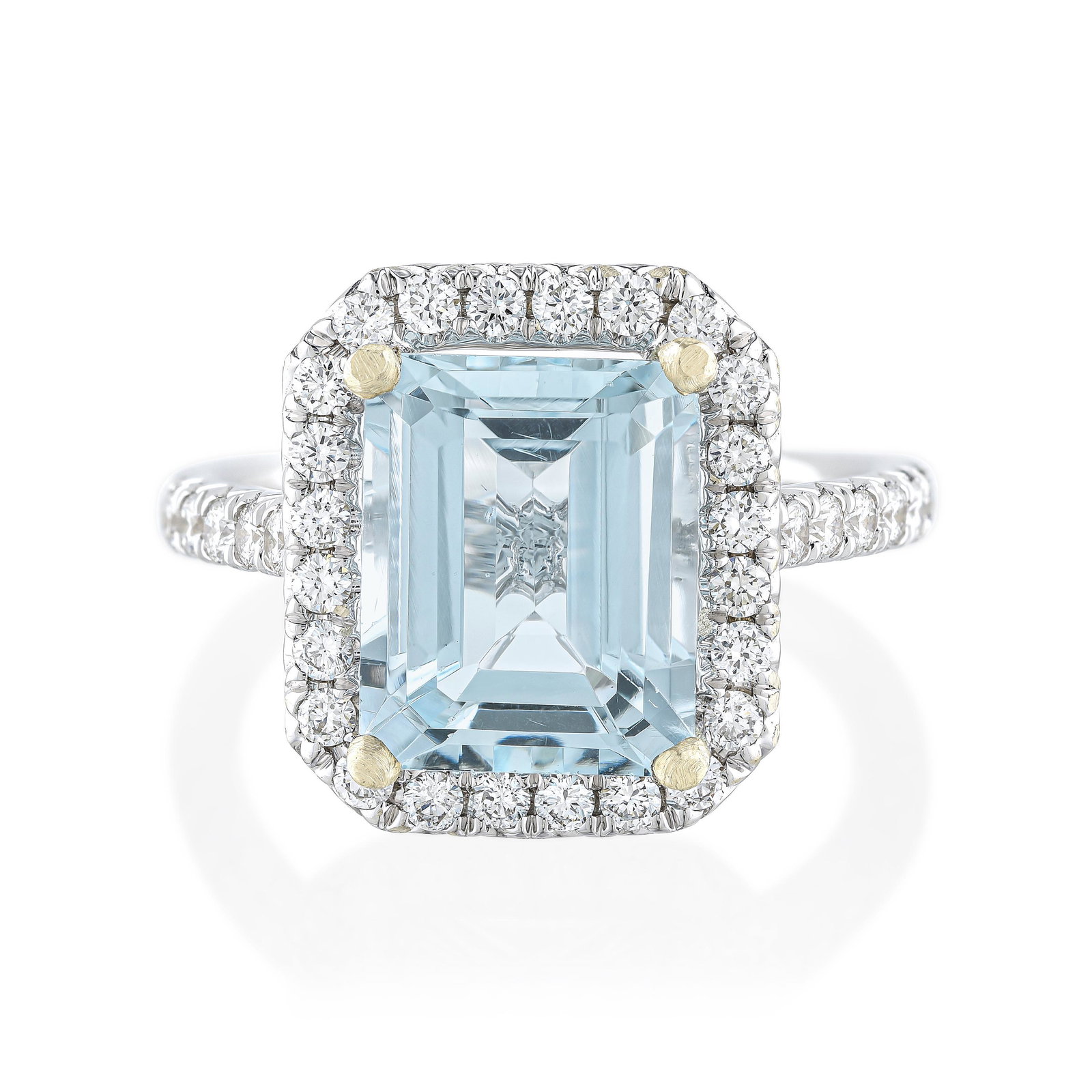 Aquamarine and Diamond Ring: METAL: 18K white gold GEMSTONE(S): rectangular faceted aquamarine approx. 3.29 carats; round brilliant cut diamonds approx. 0.68 carat total, most H-I/SI1-SI2 MEASUREMENTS: ring top 1/2 inch at widest