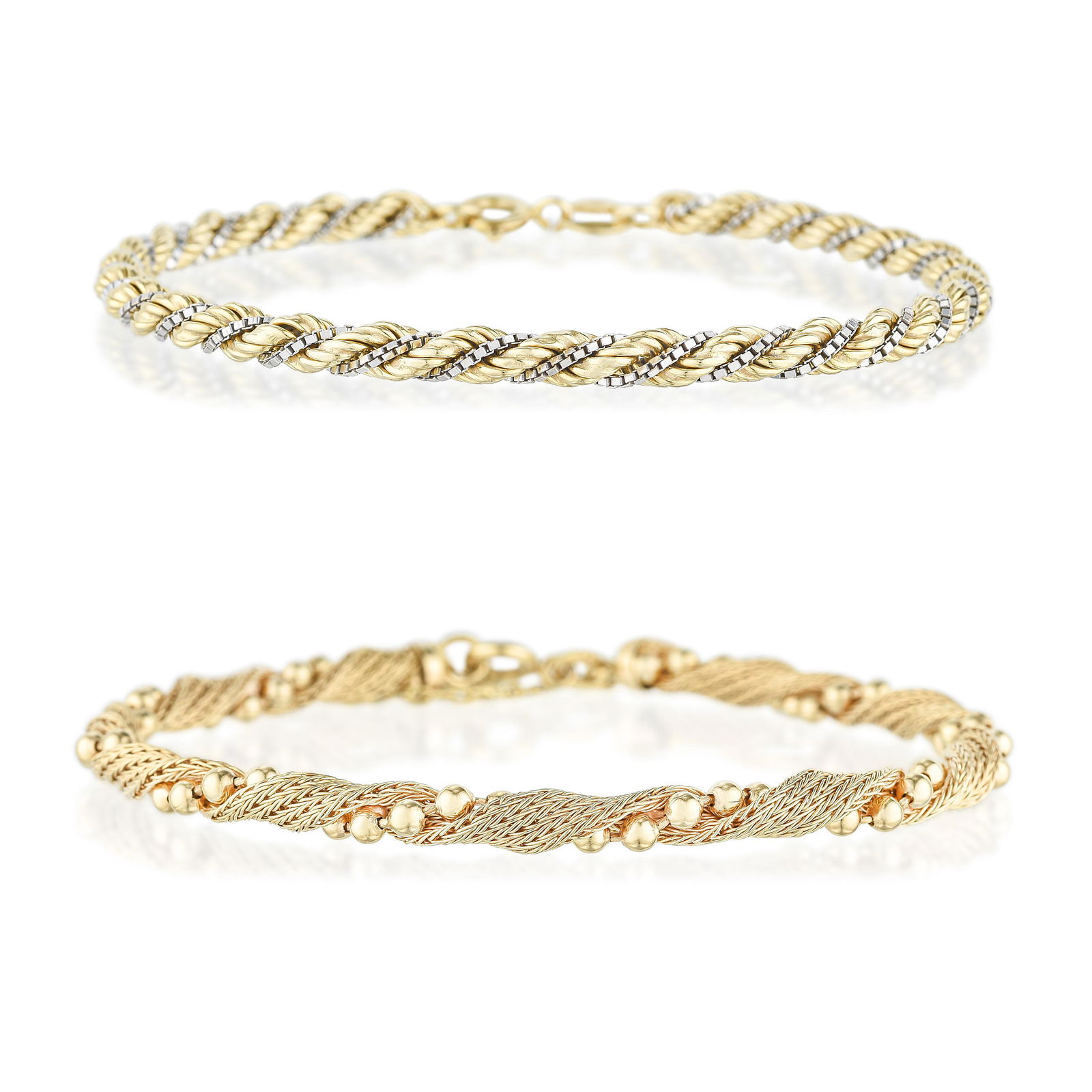 Set of Two Twisted Link Bracelets: METAL: 18K yellow goldMEASUREMENTS: 6-3/4 inches; 7-1/4 inchesWEIGHT: 16.40 g. Lot comes with two bracelets.Stamped: 750, ItalyPROPERTY OF AN ALABAMA ESTATE