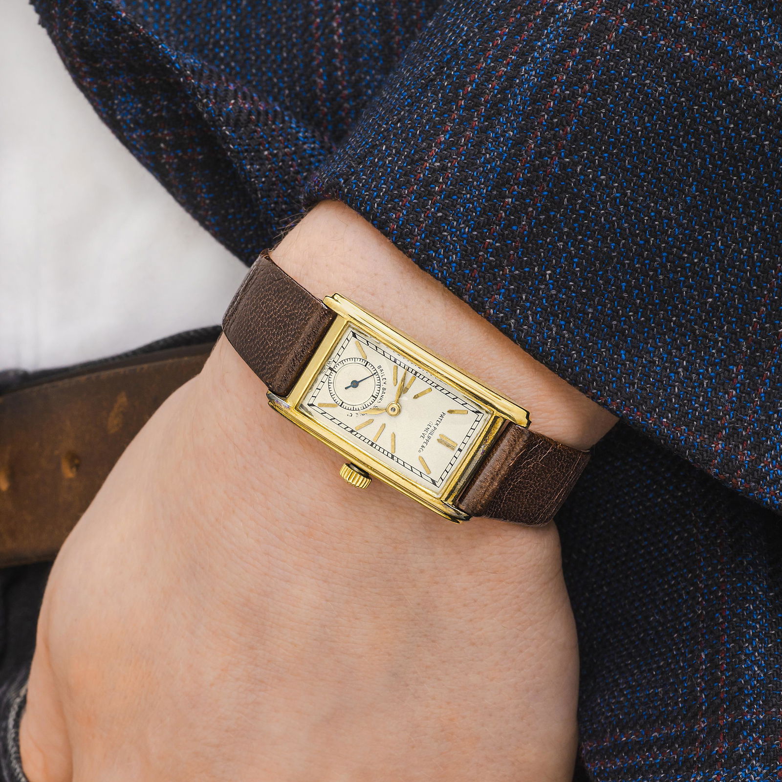 Patek Philippe Bailey, Banks & Biddle Co in 18K Gold: View a video of this lot: Click HereCIRCA: 1930sSERIAL NUMBER: 611403CASE MATERIAL: 18K yellow goldCASE DIMENSIONS: 20 mm wide x 36 mm lug-to-lugDIAL: Opaline