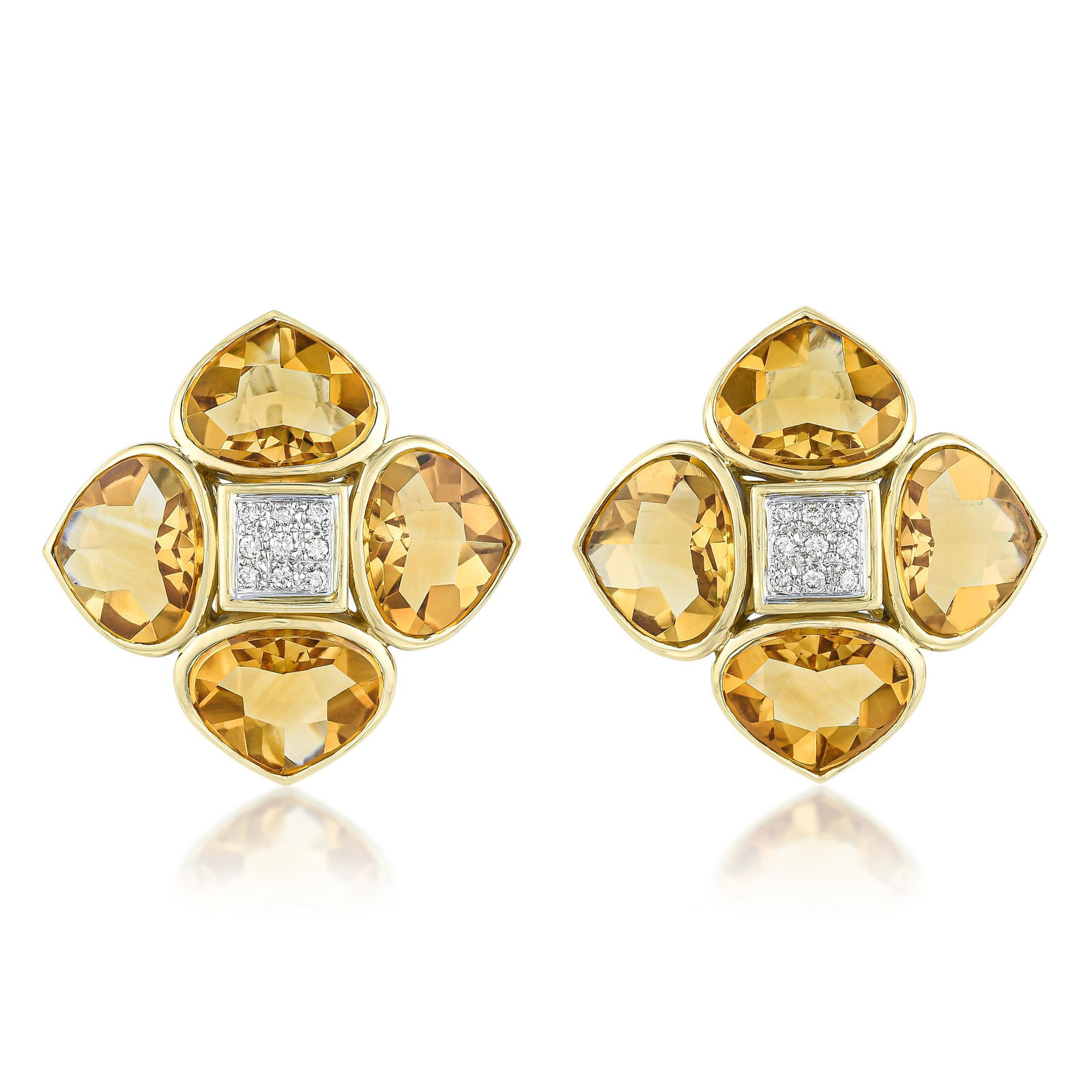 Antonini Citrine Earrings: View a video of this lot: Click HereCrafted in 18K yellow gold, 18K white gold; set with modified pear shape buffed top citrines, weighing a total of approximately 26.55 carats; round