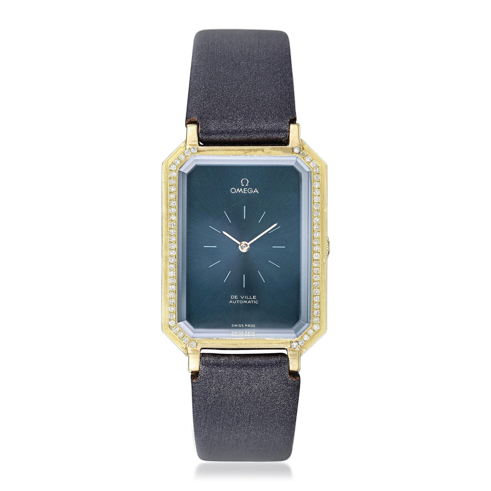 Omega DeVille by Andrew Grima in 18K Gold: Summary of Key CharacteristicsCIRCA: 1971 SERIAL NUMBER: 33947223 REF.: 8326 CASE MATERIAL: 18K yellow gold CASE DIMENSIONS: 26.5 mm wide x 40 mm lug-to-lug DIAL: Sunburst dial in blue-grey with white