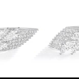 Van Cleef & Arpels Antoinette Heart Shaped Diamond Ring: View a video of this lot: Click HereSummary of Key Characteristics • Metal: 18K white gold • Gemstone(s): heart and round brilliant cut diamonds appr