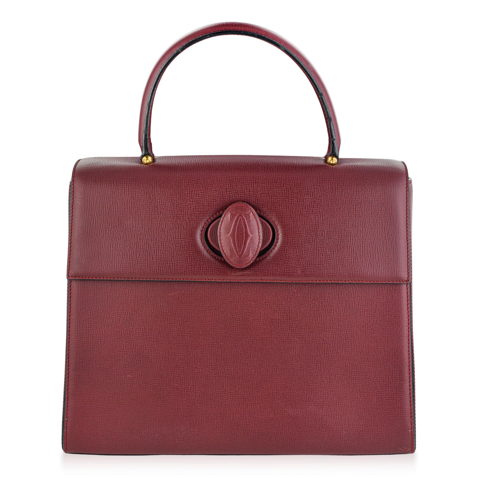 Cartier Must Handbag: The Cartier Must handbag is crafted from smooth Bordeaux leather, combining classic elegance with versatile functionality. Its structured silhouette is ideal for everyday use, reflecting Cartier's tim