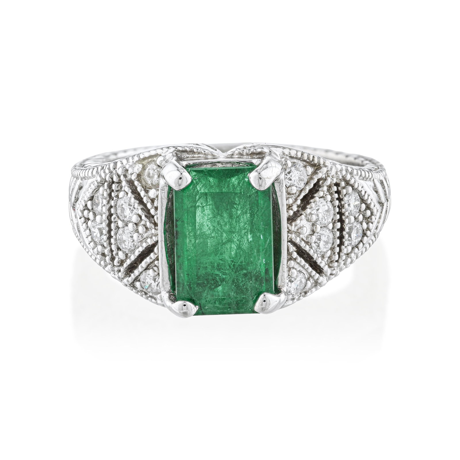 Emerald and Diamond Ring: Summary of Key Characteristics • Metal: 14K white gold • Gemstone(s): Emerald cut emerald approx.2.58 carts; round brilliant cut diamonds approx.0.25 carats. • Measurements: 10 mm at wi