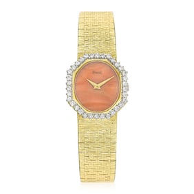 Piaget Ladies' Bracelet Watch in 18K Gold with Coral Dial