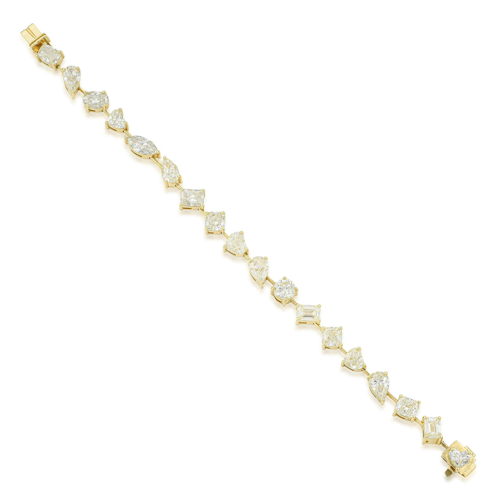 Fancy Shape Diamond Bracelet: Summary of Key Characteristics • Metal: 18K yellow gold • Gemstone(s): (18) fancy shape diamonds approx. 18.18 carats total, most I-K/VS-SI • Measurements: 7 inch length •