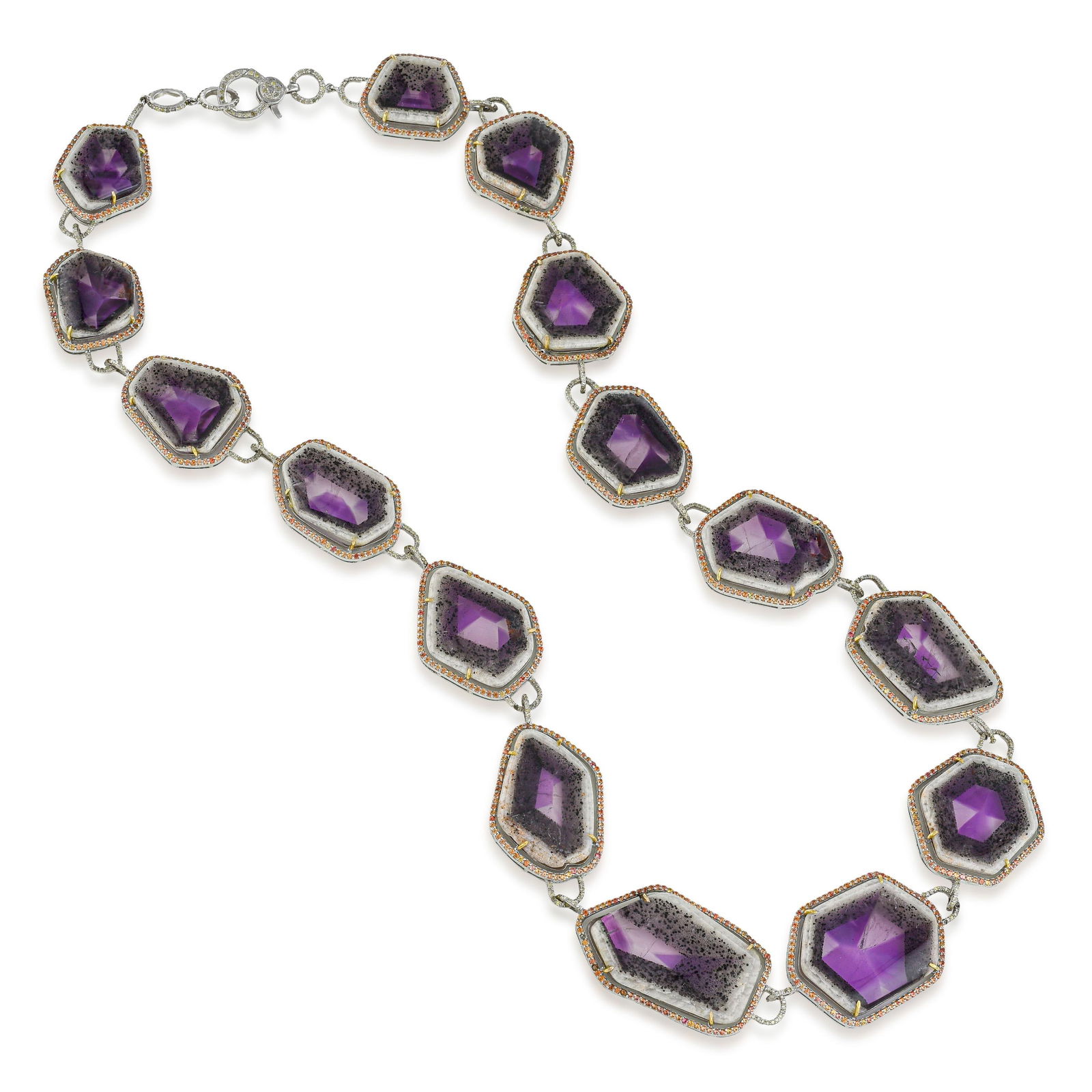 Kiwi Amethyst Sapphire and Diamond Station Necklace: Summary of Key Characteristics • Metal: Silver and 14K gold • Gemstone(s): Amethyst approx. 315.15 carats total; sapphires approx. 9.57 carats total; round cut diamonds approx. 1.76