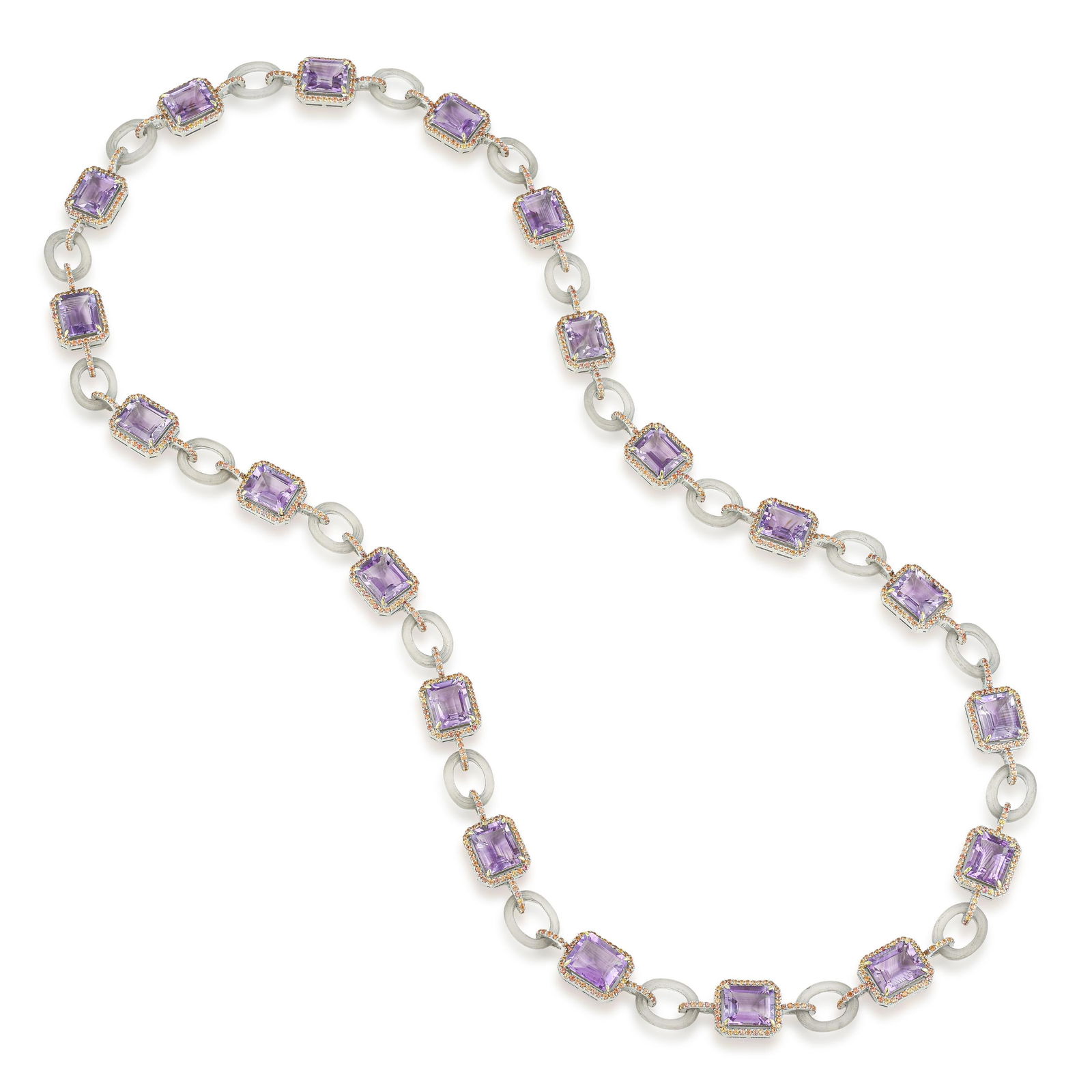 Amethyst Rock Crystal and Sapphire Long Necklace: Summary of Key Characteristics • Metal: Silver, 14K yellow gold • Gemstone(s): Emerald cut amethyst approx. 60.64 carats total; rock crystal hoops approx. 36.00 carats total; multicolor