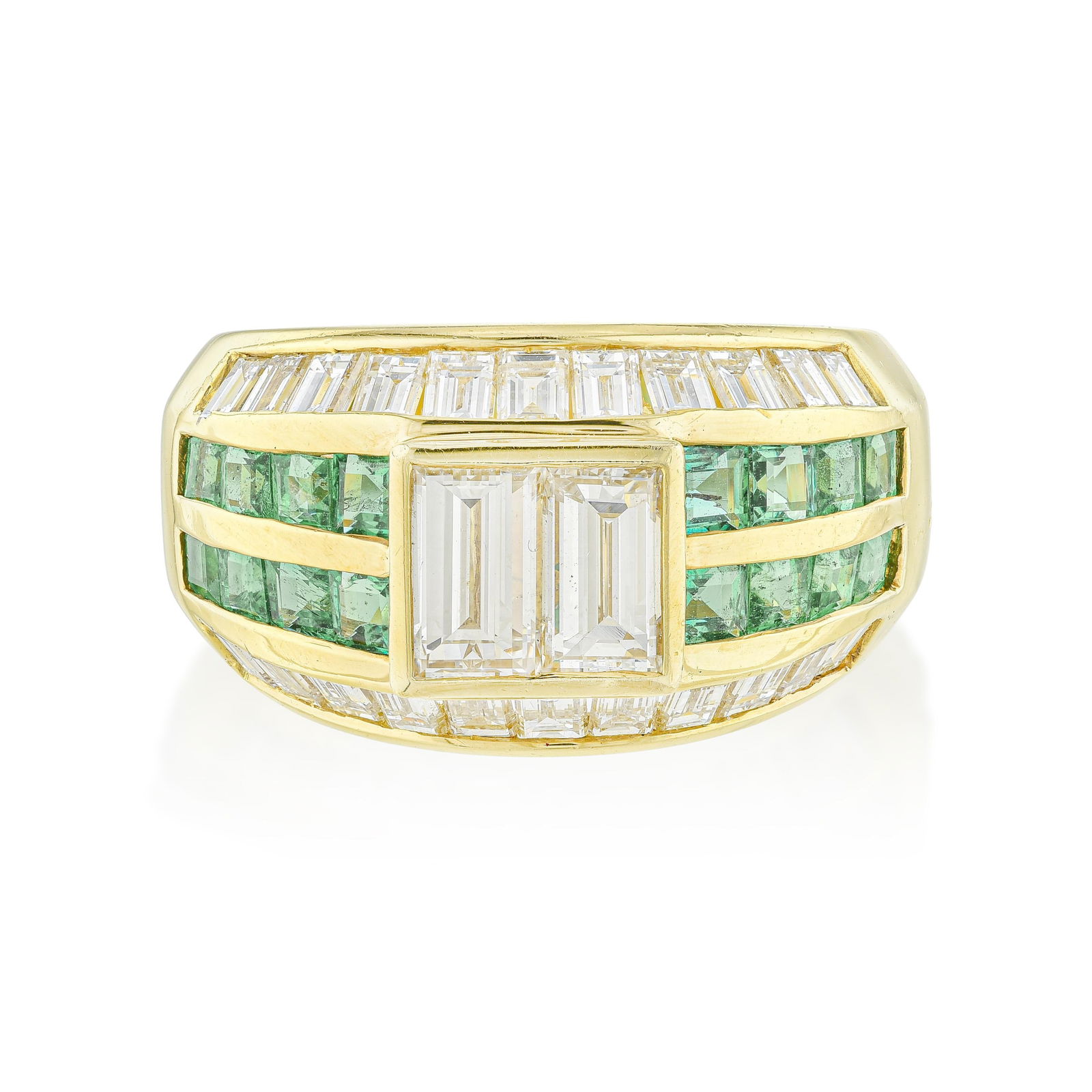 Emerald and Diamond Ring: Summary of Key Characteristics • Metal: 18K yellow gold • Gemstone(s): Square cut emeralds approx. 1.00 carats total; emerald cut diamonds approx. 2.35 carats total, most F-G/VS •