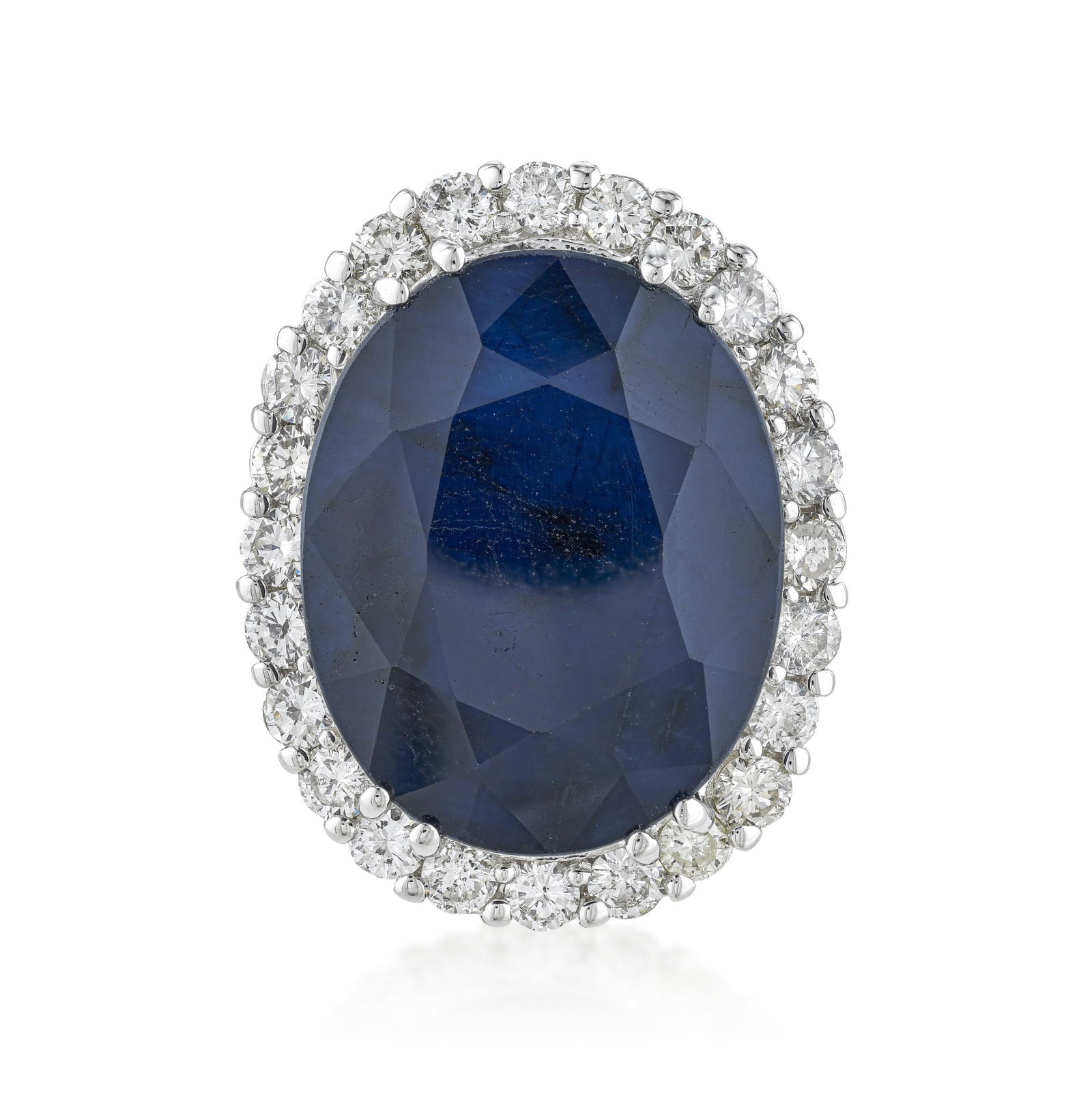 Sapphire and Diamond Statement Ring: Summary of Key Characteristics • Metal: 14K white gold • Gemstone(s): Oval shape sapphire approx. 23.32 carats ; round brilliant cut diamonds approx.1.44 carats , most G-H/VS-SI •