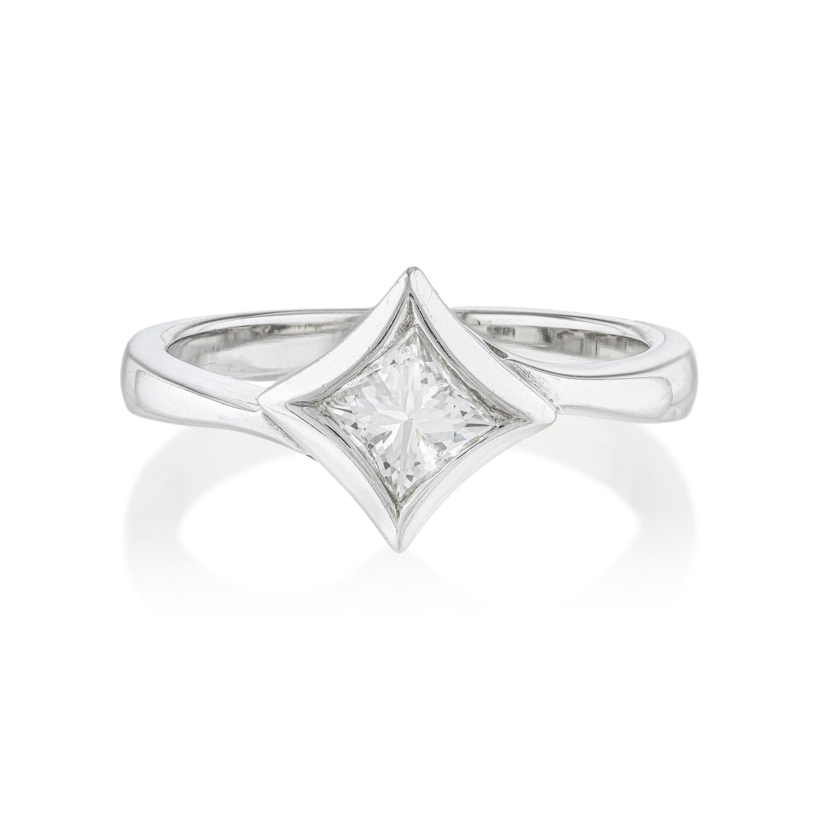 Modernist Princess-Cut Diamond Ring: Summary of Key Characteristics • Metal: 14K white gold • Gemstone(s): Princess cut diamond approx. 0.50 carats H-I/VS • Measurements: 10mm at widest • Ring Size: 7 3/4 •
