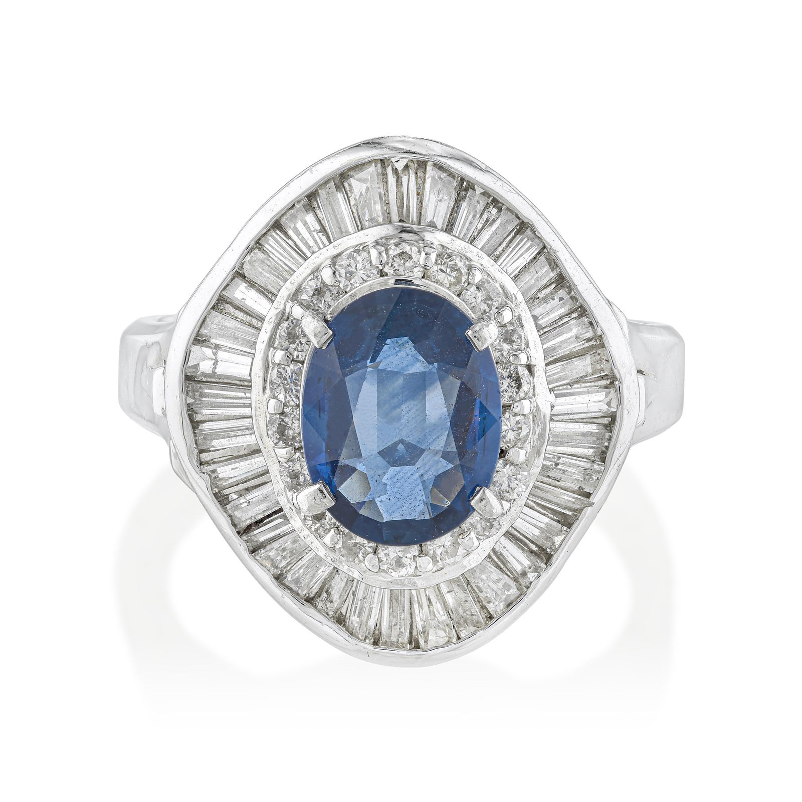 Sapphire and Diamond Ballerina Ring: Summary of Key Characteristics • Metal: platinum • Gemstone(s): Oval shape sapphire approx. 1.60 carats; mix shape diamonds approx. 1.04 most,H-I/SI • Measurements: 18 mm long 