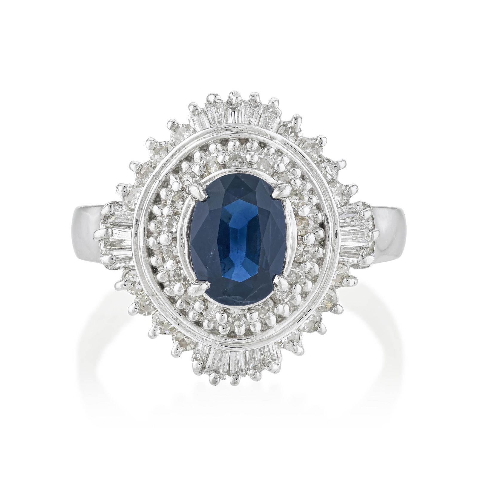Sapphire and Diamond Ring: Summary of Key Characteristics • Metal: platinum • Gemstone(s): Oval sapphire approx. 0.97 carats; mix shape diamonds approx.0.57 carats total, most H-I/SI • Measurements: 15mm at
