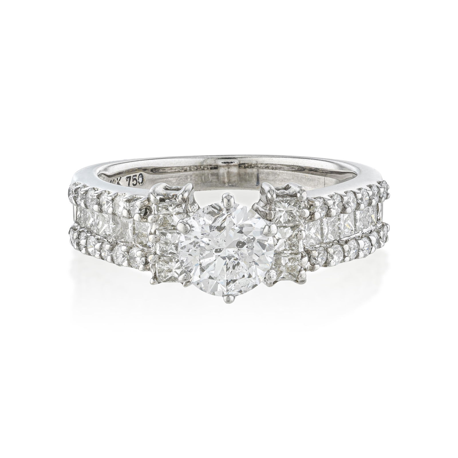 Diamond Ring: Summary of Key Characteristics • Metal: 18k white gold • Gemstone(s): (1)round brilliant cut diamond approx.0.80 carat G-H/SI; Small diamonds approx. 1.00 carats total •