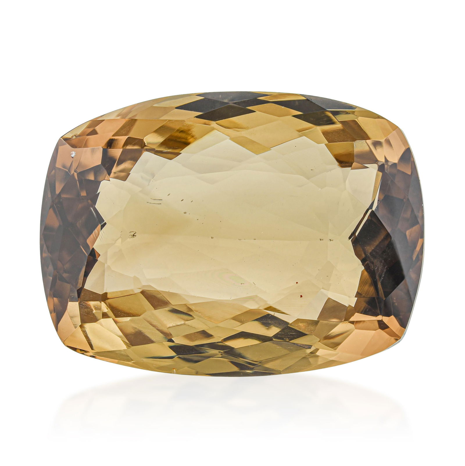 71.78-Carat Cushion Fancy Cut Smoky Quartz: Summary of Key Characteristics • Gemstone(s): 71.78-Carat Cushion Fancy Cut Smoky Quartz • Measurements: 27.7mm L x 20.5mm W x 12.7mm H • Condition: In excellent condition. 