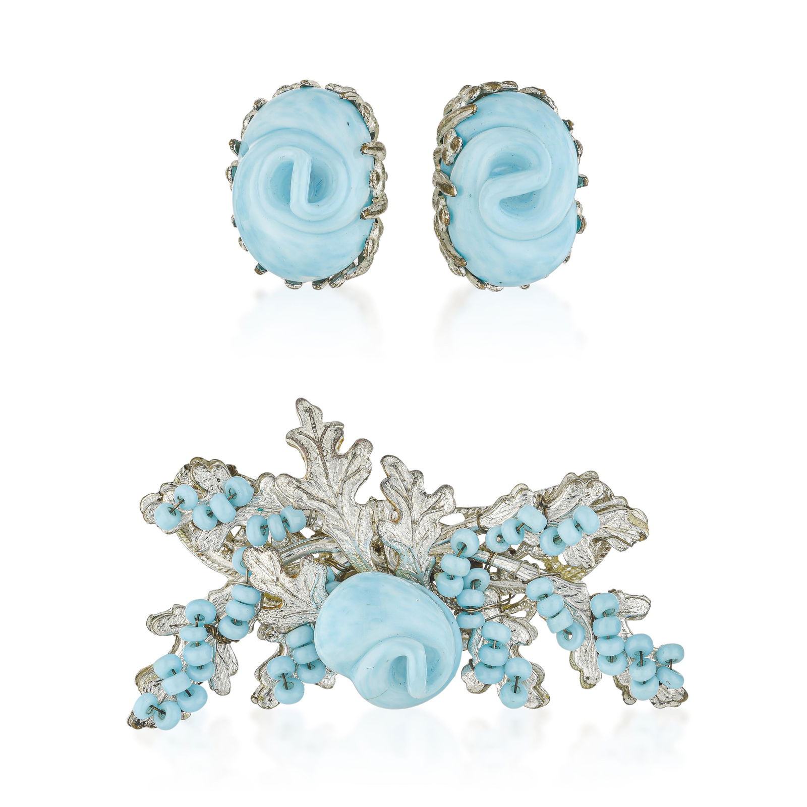 Miriam Haskell Light Blue Glass Brooch and Earrings Set - No Reserve: Summary of Key Characteristics • Metal: Silver tone base metal • Gemstone(s): Light blue colored glass, rhinestones • Measurements: Brooch 2 x 1 inches • Condition: