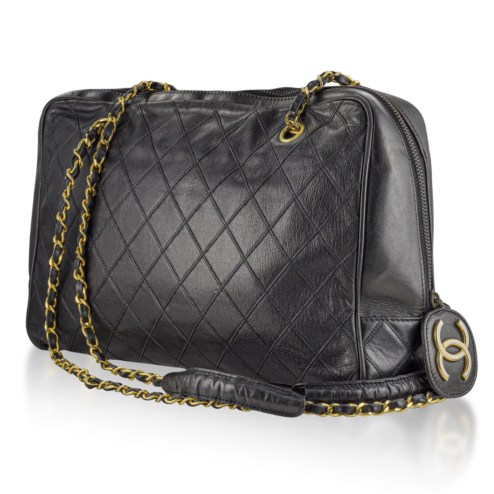 Chanel Bicolore Chain Matelasse Shoulder Bag: This Chanel Bicolore Chain Matelasse Shoulder Bag is crafted from luxurious black lambskin leather with the Maison’s iconic diamond quilting and classic chain-and-leather shoulder strap.
