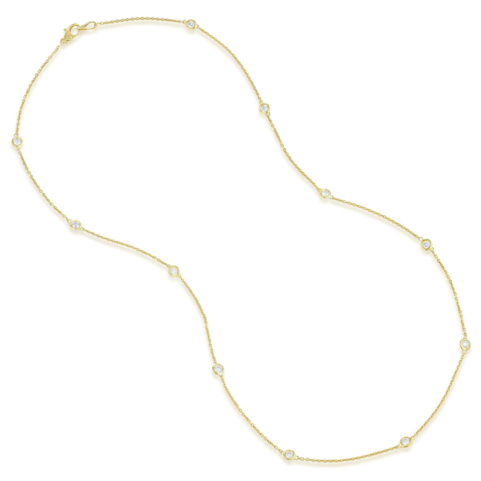 Diamond Station Necklace: Round brilliant diamonds totaling approximately 1.08 carats set as stations along a 17.5-inch 14K yellow gold chain: this is a necklace of refined simplicity — warm gold punctuated by bright