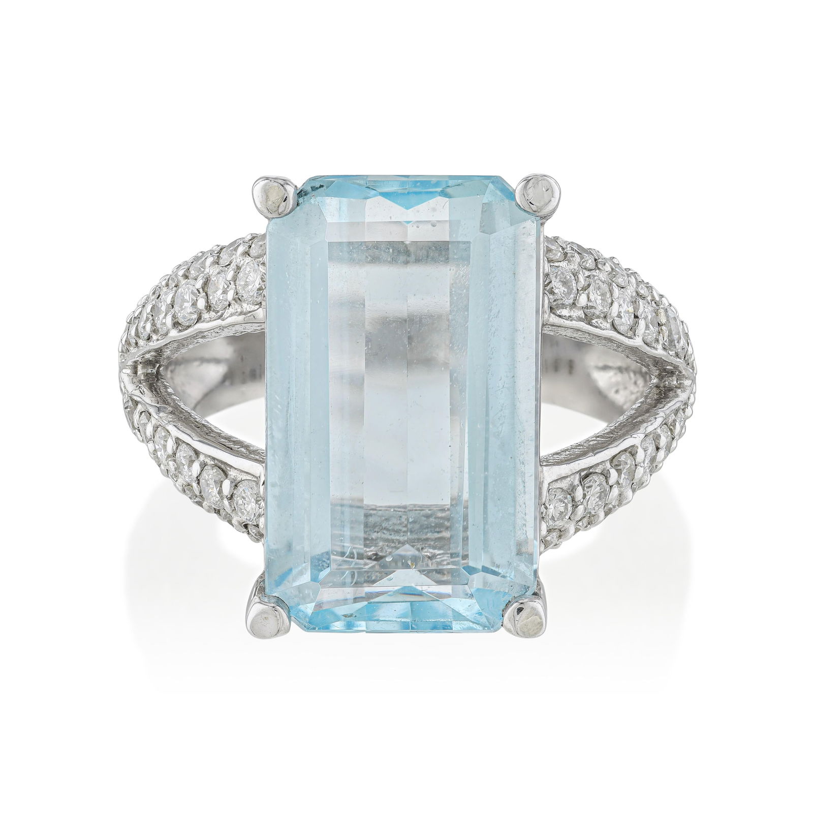 Blue Topaz and Diamond Ring: An 8.91-carat emerald-cut blue topaz set in 14K white gold with approximately 1.25 carats of G-H/SI round brilliant diamonds: the emerald cut is the ideal format for a stone as transparent and