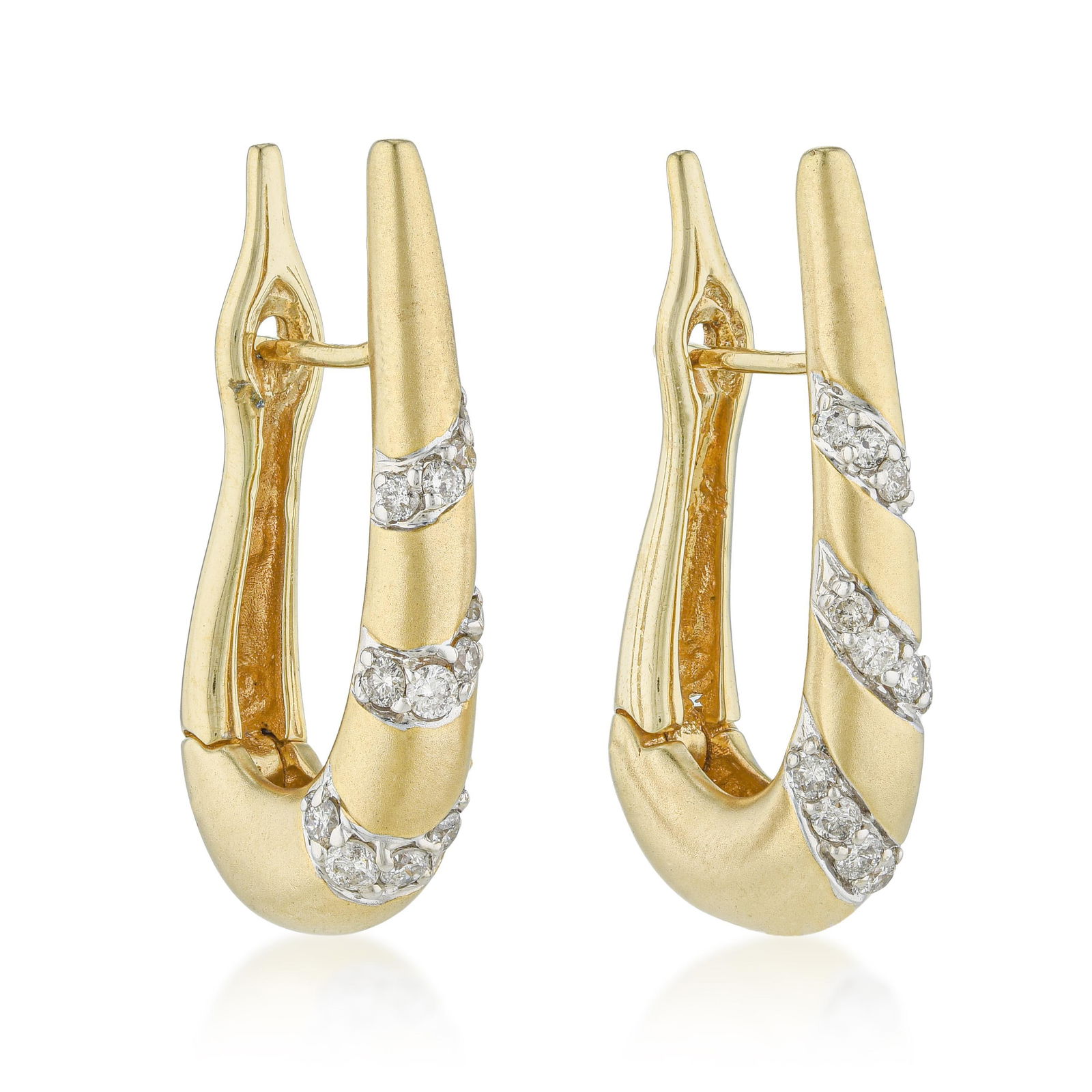 Sculptural Gold Diamond Hoop Earrings: Sculptural gold hoop earrings in 14K gold with approximately 0.73 carats of round brilliant diamonds at 1.25 inches long and 9.3 grams: the word 'sculptural' here is earned — the design extends