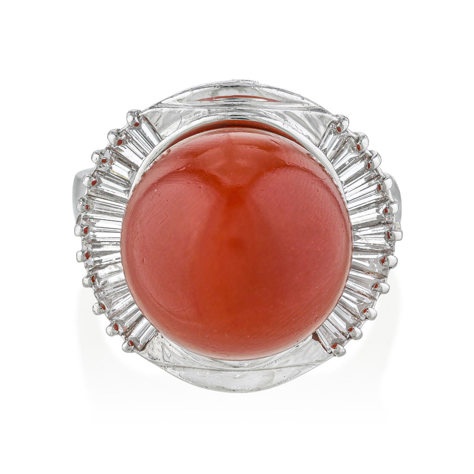 Coral and Diamond Ring: Coral in fine jewelry has an ancient and distinguished history — it has been prized since antiquity for its warmth and rarity. This 10mm coral bead, set in platinum with approximately 0.47