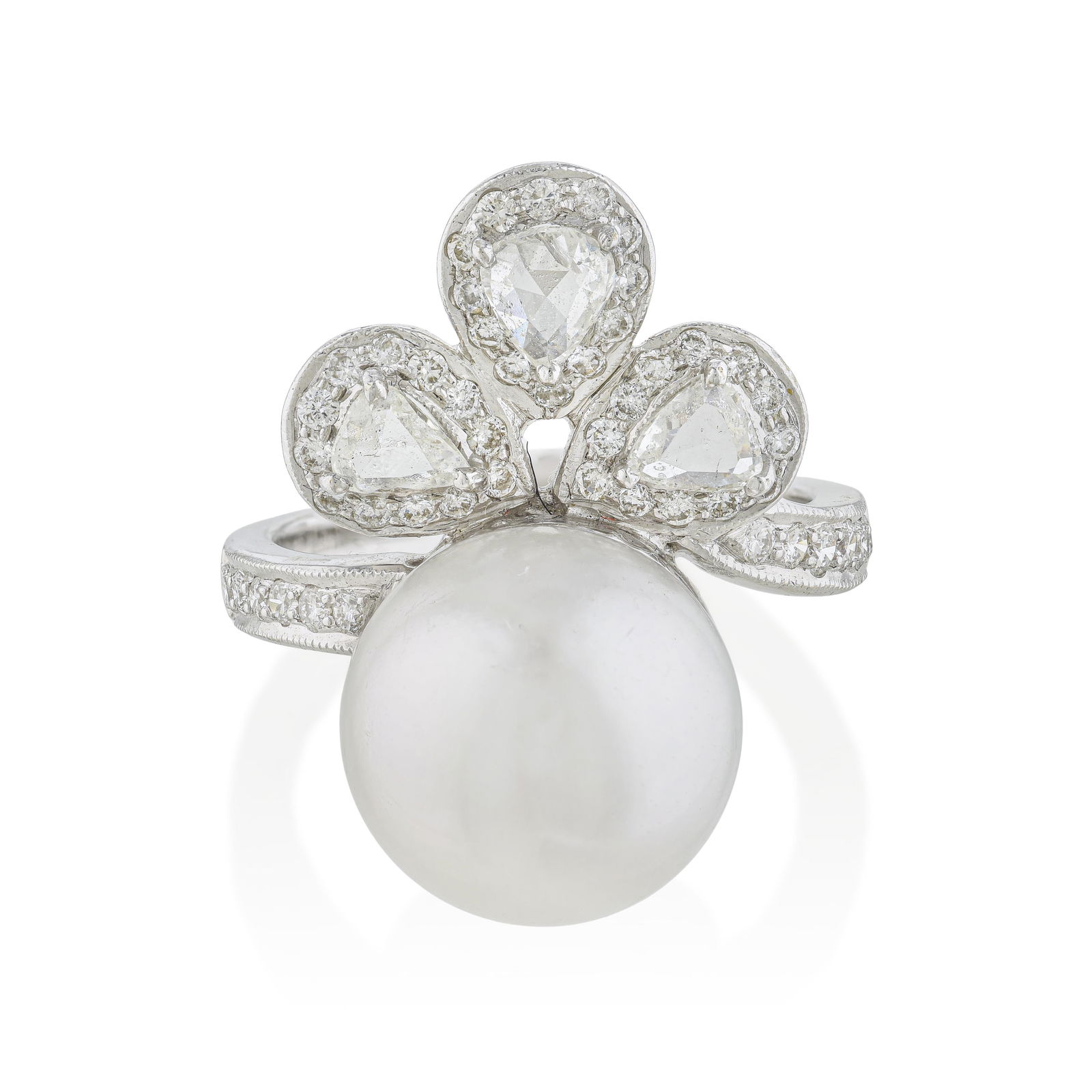 Pearl and Diamond Ring: ESTIMATED RETAIL PRICE: $5,000* *This is the estimated value a piece of similar quality, craftsmanship, and characteristics could command at retail. Pearls and pear and round brilliant diamonds