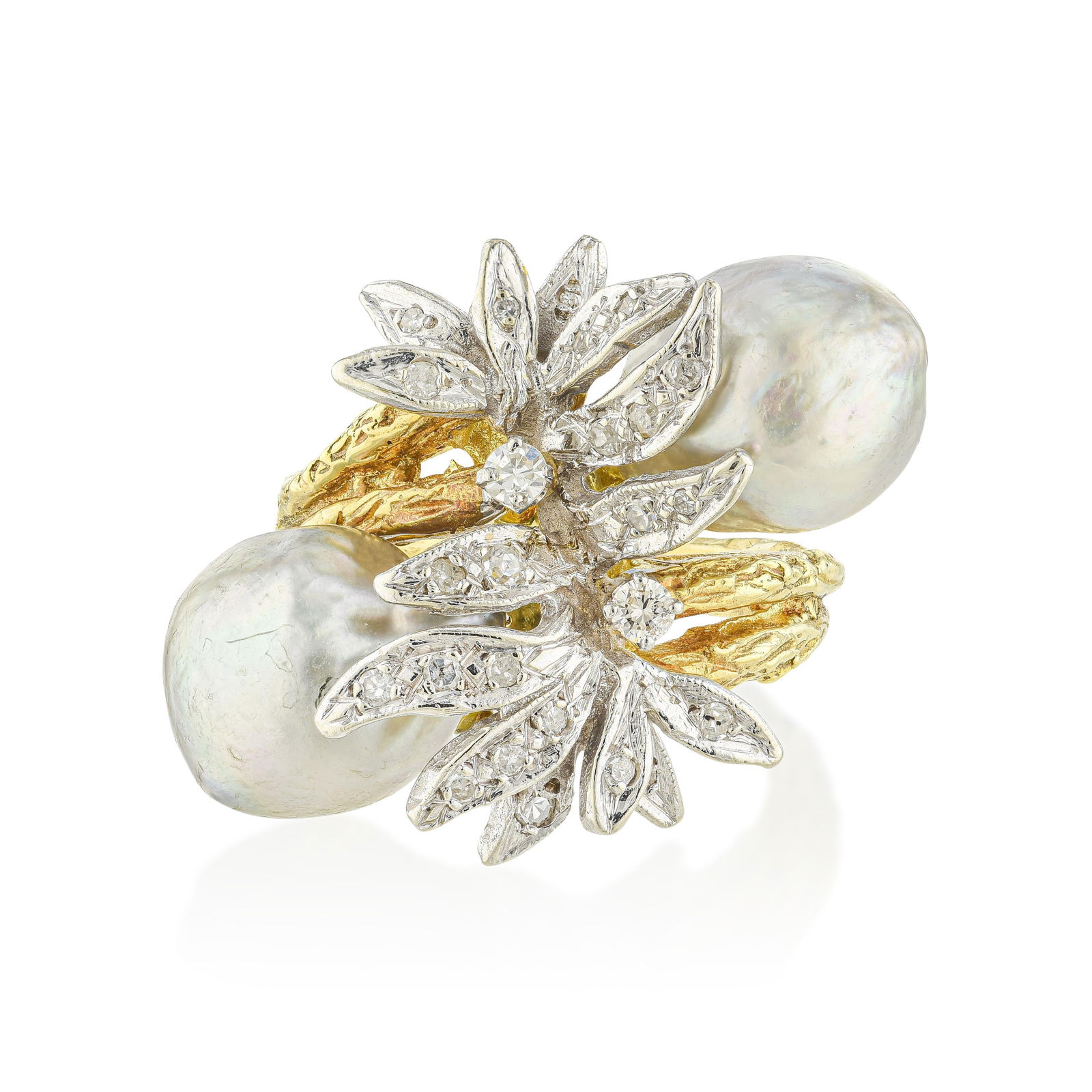 Vintage Pearl And Diamond Bypass Ring, C1960s: A 1960s bypass ring in 18K yellow and white gold, pairing two pearls of approximately 10mm x 8mm with approximately 0.60 carats of round diamonds in a design where the pearls curve around the finger