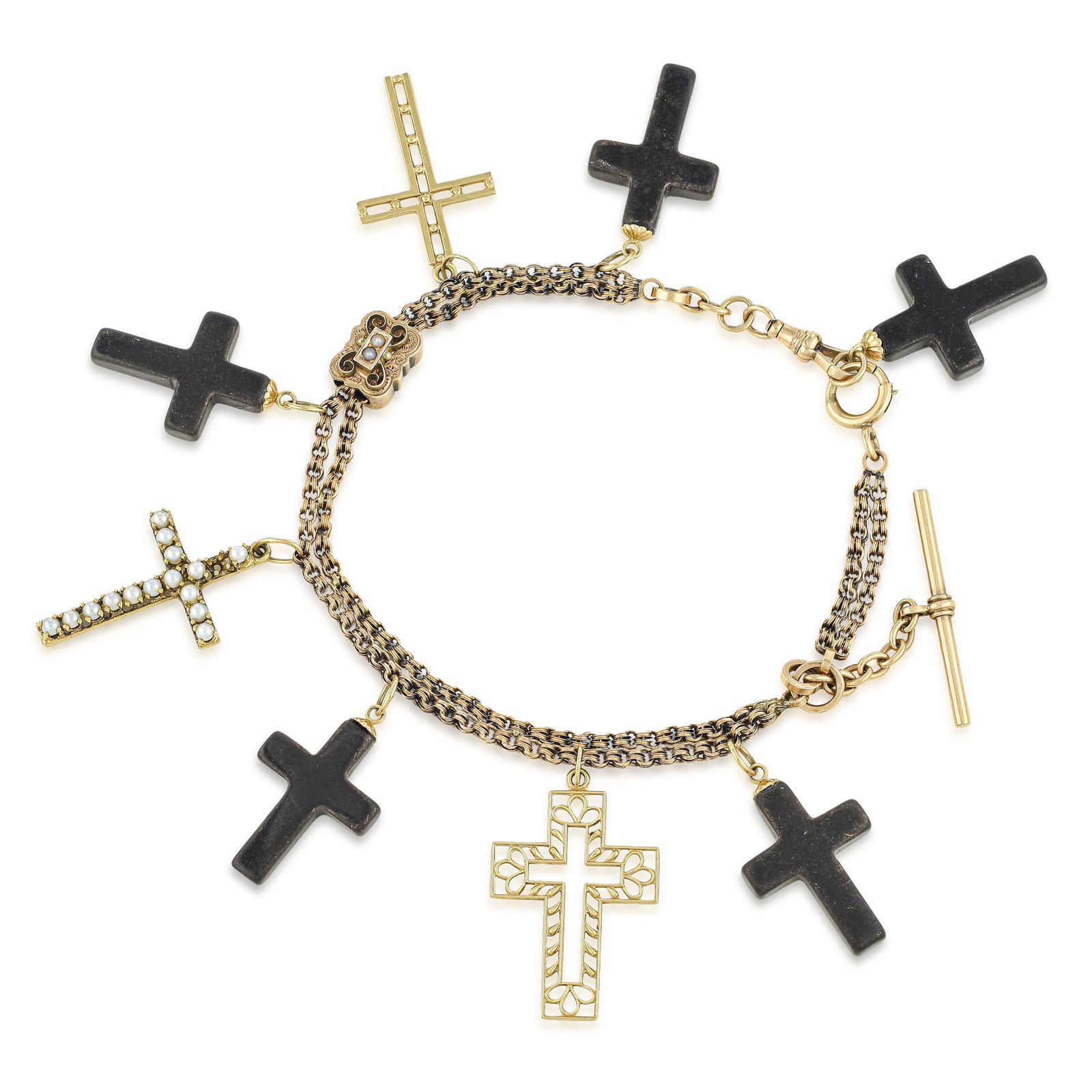 Vintage Multiple Cross Charm Bracelet: A vintage 14K yellow gold multiple cross charm bracelet at 8 inches and 27.2 grams: charm bracelets are the most personal expression in the jewelry lexicon, and a bracelet built around the cross
