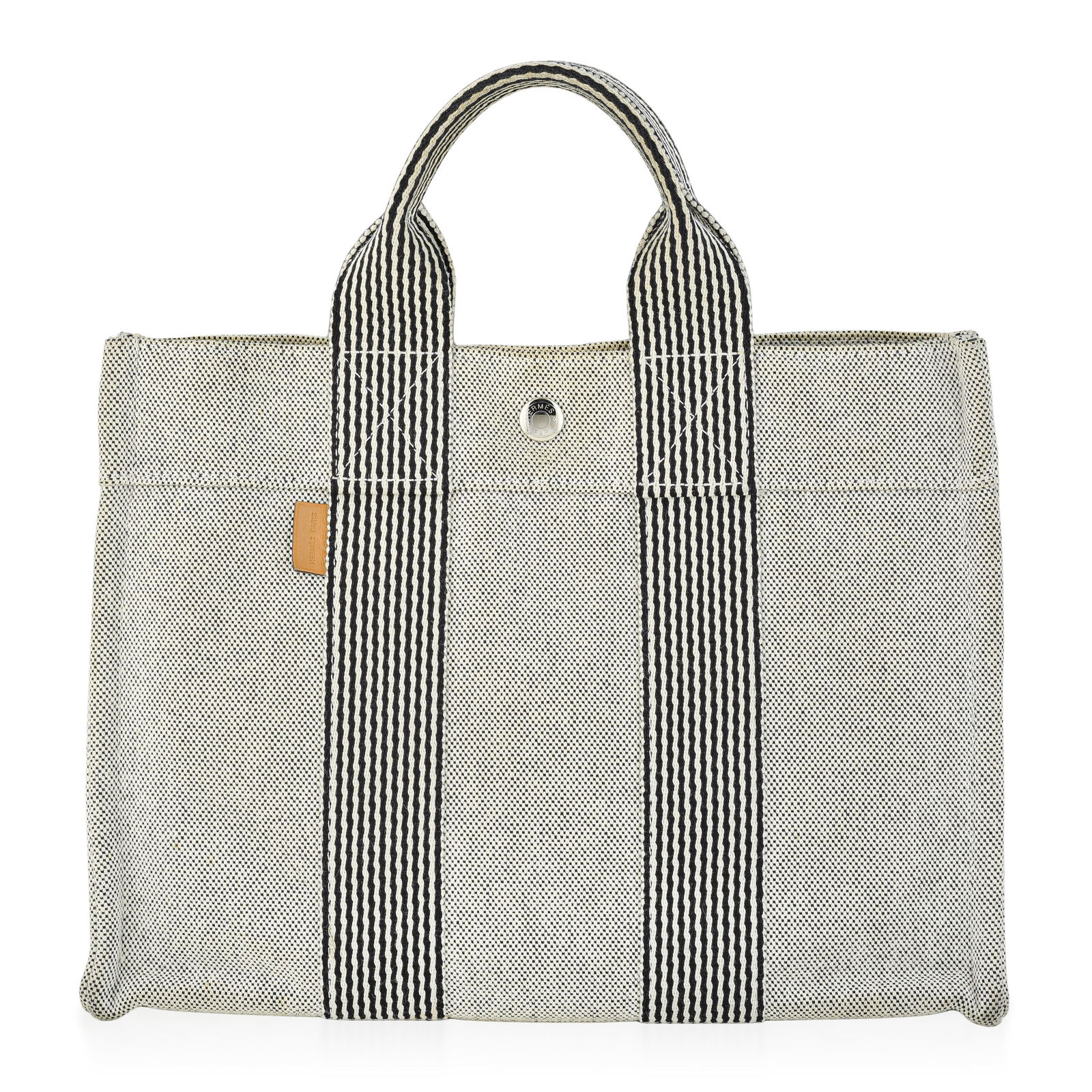 Hermes Fourre Tout PM Canvas Tote, Gray: ESTIMATED RETAIL PRICE: $450* *This is the estimated value a piece of similar quality, craftsmanship, and characteristics could command at retail. The Fourre Tout PM (Petit Modele) is the smaller
