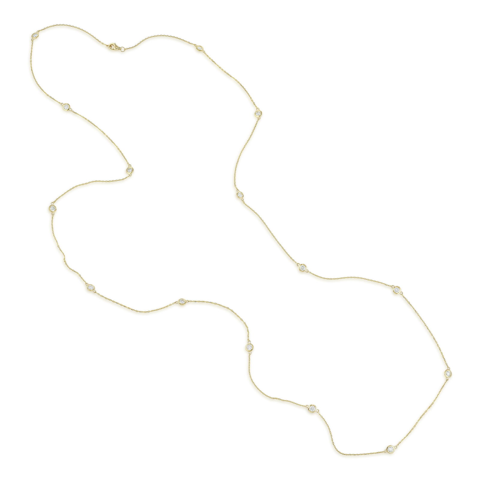 Diamond Bezel Station Long Necklace: ESTIMATED RETAIL PRICE: $3,400* *This is the estimated value a piece of similar quality, craftsmanship, and characteristics could command at retail. Fifteen bezel-set round brilliant diamonds,