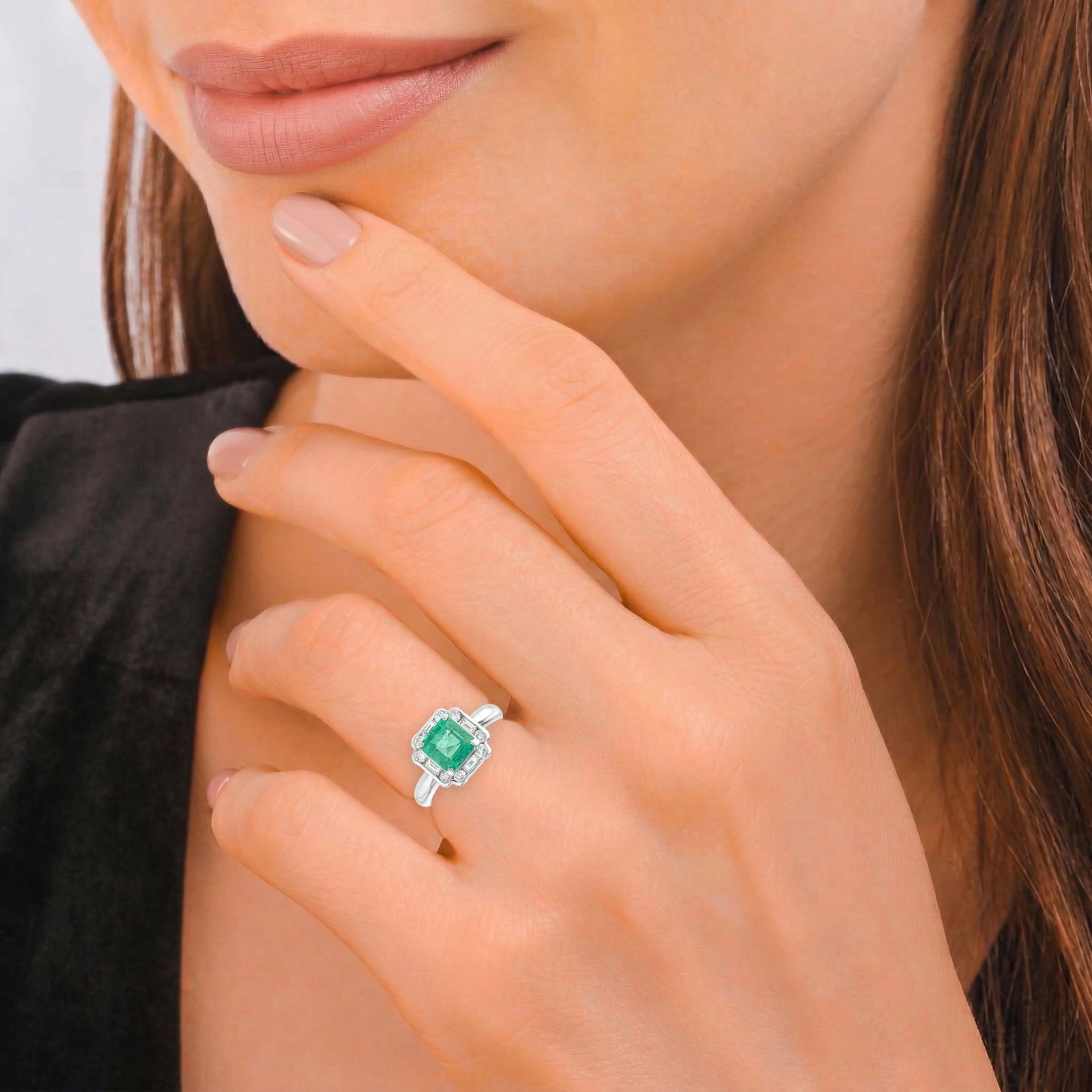 Emerald and Diamond Ring: ESTIMATED RETAIL PRICE: $5,000* *This is the estimated value a piece of similar quality, craftsmanship, and characteristics could command at retail. The emerald-cut emerald and the emerald-cut