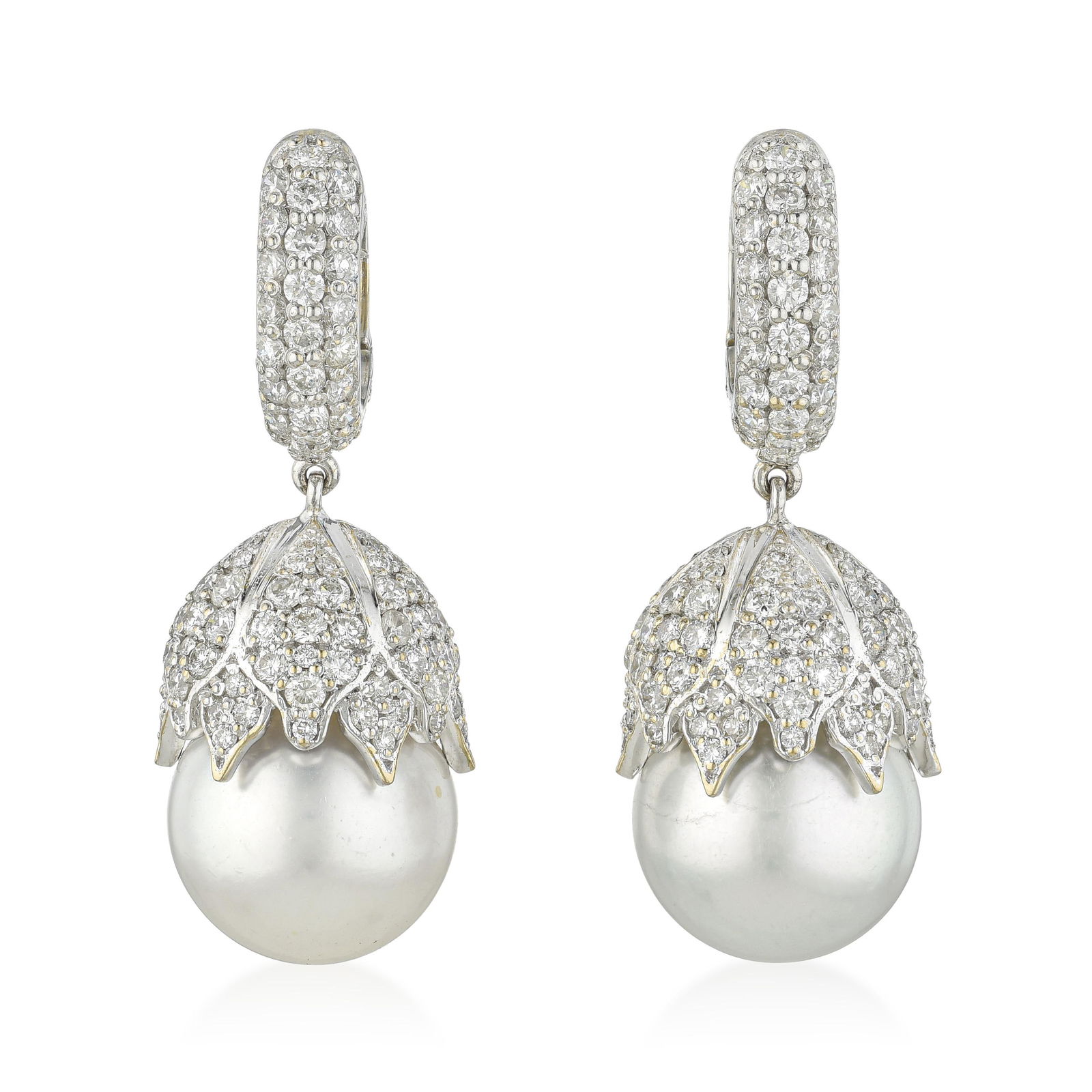 Pearl and Diamond Earrings: ESTIMATED RETAIL PRICE: $15,000* *This is the estimated value a piece of similar quality, craftsmanship, and characteristics could command at retail. Approximately 4.82 carats of round