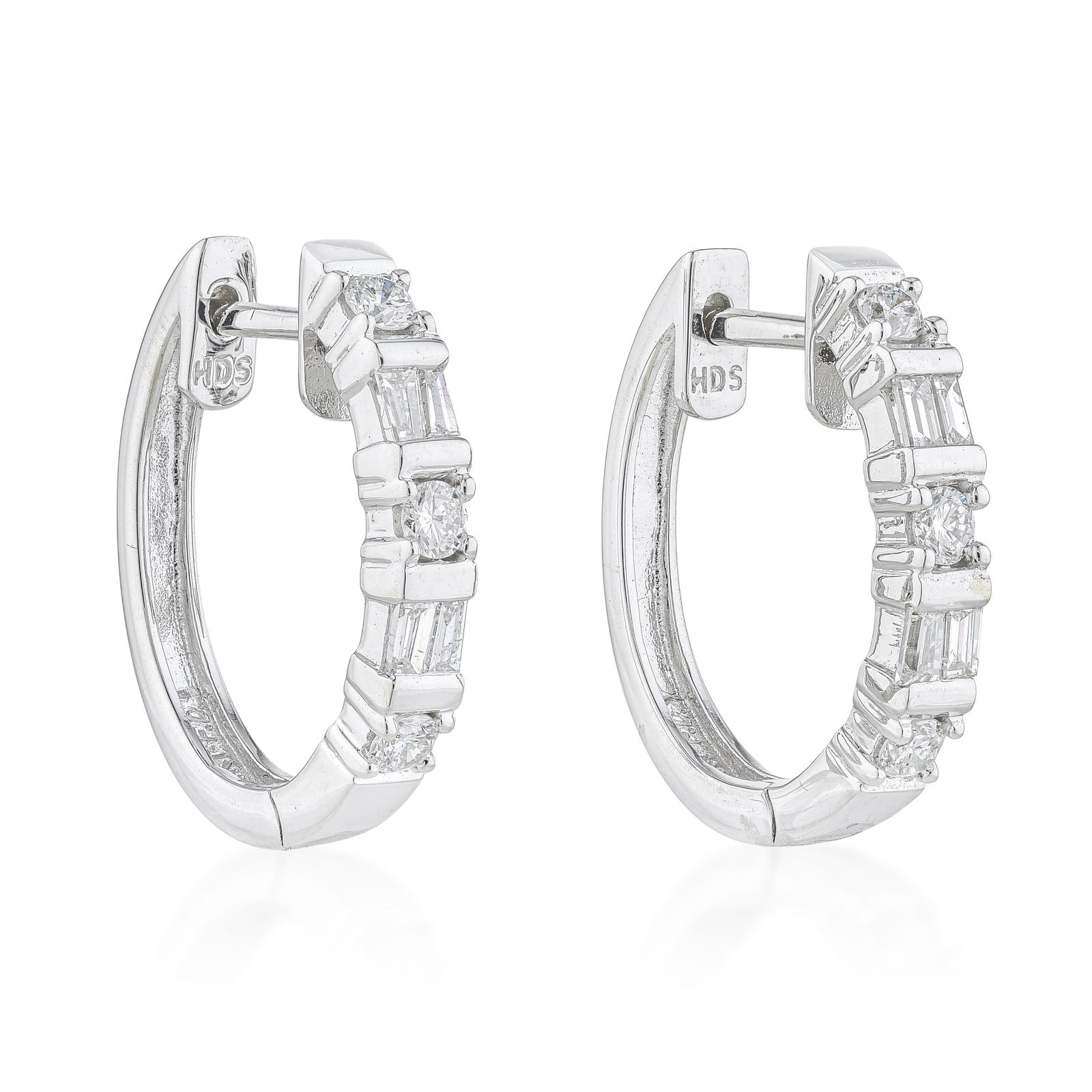 Diamond Hoop Earrings: ESTIMATED RETAIL PRICE: $1,800* *This is the estimated value a piece of similar quality, craftsmanship, and characteristics could command at retail. Mixed-shape diamonds set along the outer edge