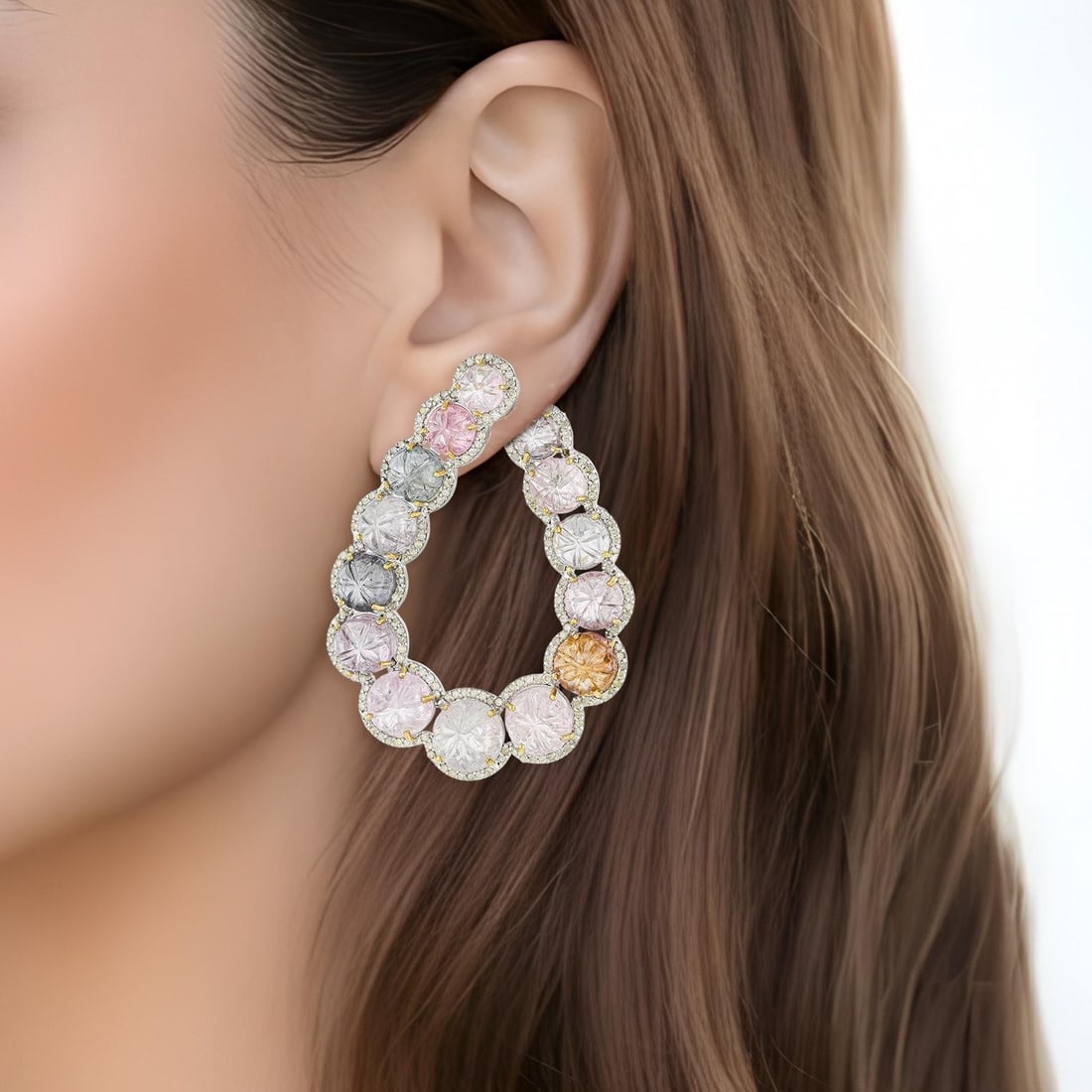 Hand Carved Burmese Spinel and Diamond Hoop Earrings: ESTIMATED RETAIL PRICE: $3,800* *This is the estimated value a piece of similar quality, craftsmanship, and characteristics could command at retail. Sixty-one carats of hand-carved Burmese spinels