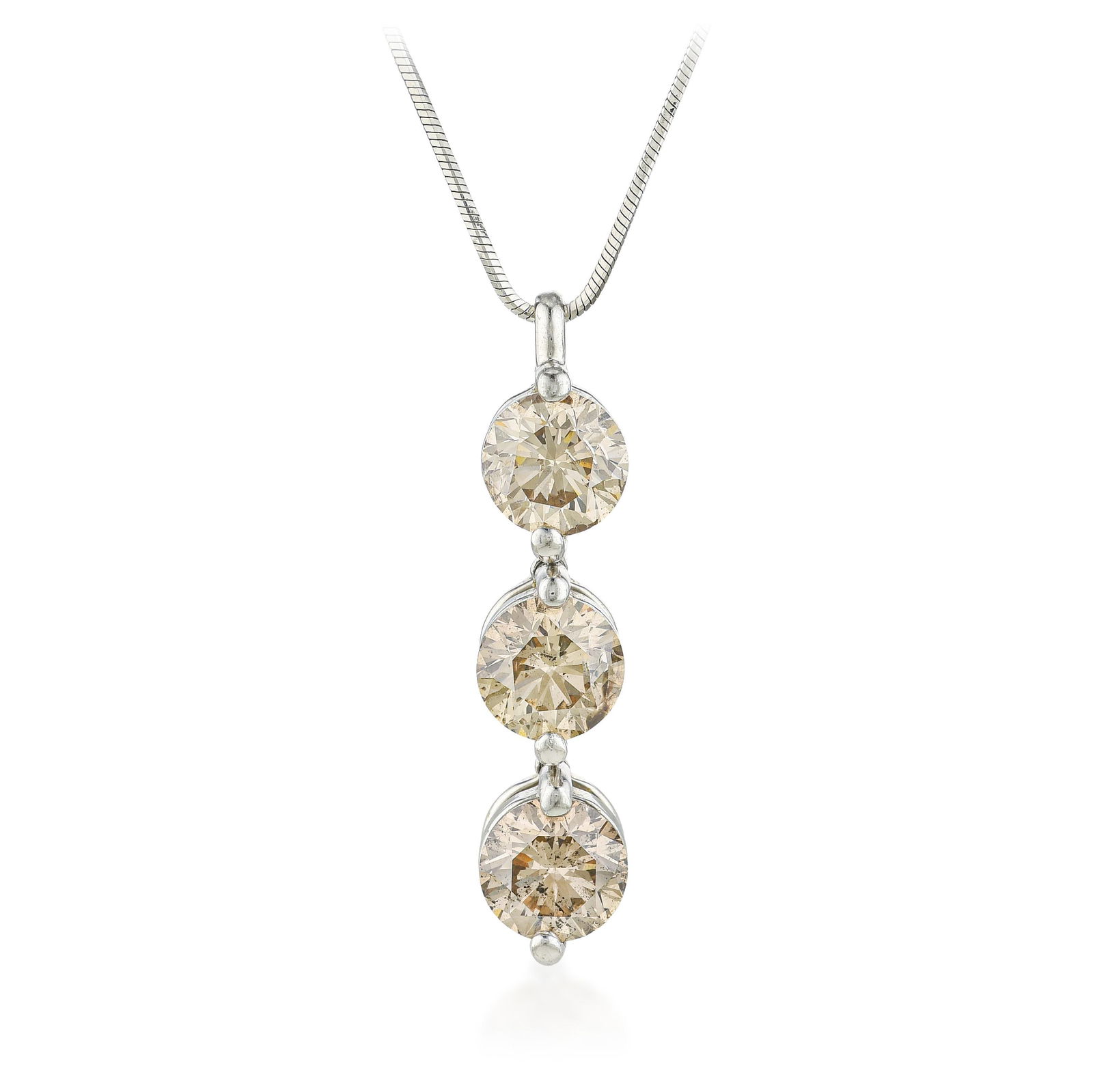 Three Diamond Drop Pendant Necklace: ESTIMATED RETAIL PRICE: $4,800* *This is the estimated value a piece of similar quality, craftsmanship, and characteristics could command at retail. There is a particular grace to a graduated