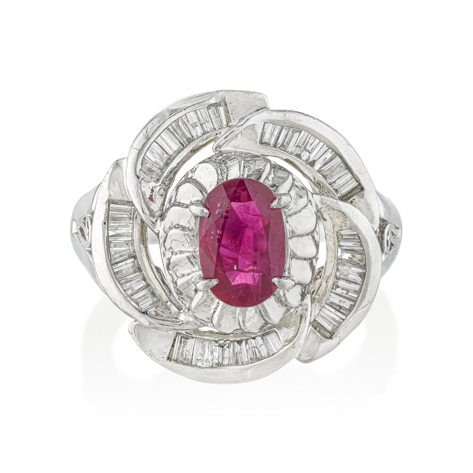 Ruby and Diamond Cocktail Ring: ESTIMATED RETAIL PRICE: $4,500* *This is the estimated value a piece of similar quality, craftsmanship, and characteristics could command at retail. A ruby and baguette diamond cocktail ring in