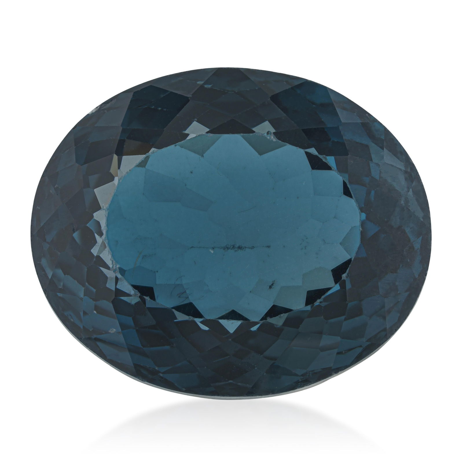 67.70-Carat Oval Fancy London Blue Topaz Loose Gemstone: ESTIMATED RETAIL PRICE: $750* *This is the estimated value a piece of similar quality, craftsmanship, and characteristics could command at retail. At 67.70 carats, this London Blue topaz oval