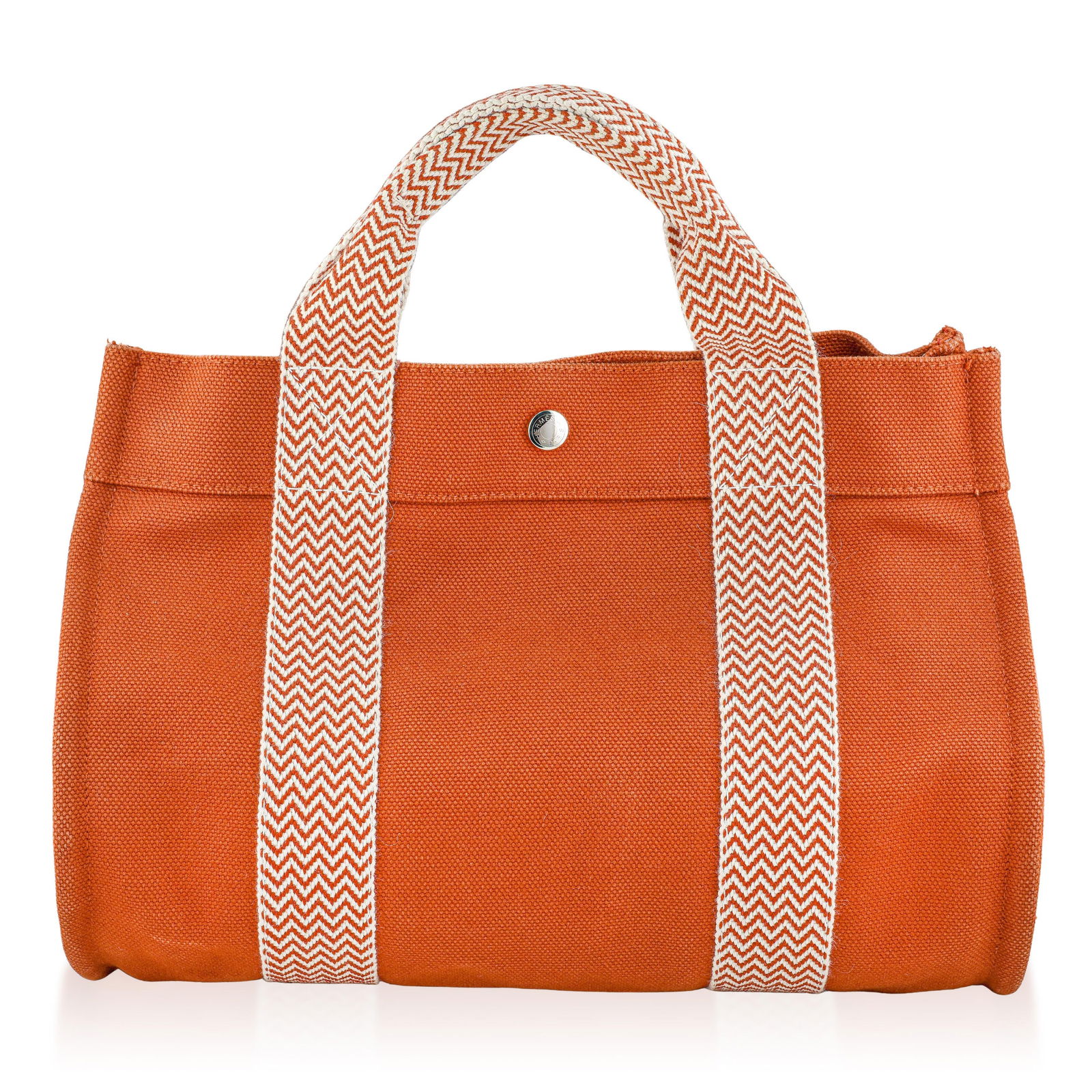 Hermes Cannes PM Tote Bag - Orange: ESTIMATED RETAIL PRICE: $850* *This is the estimated value a piece of similar quality, craftsmanship, and characteristics could command at retail. The Hermes Cannes PM Tote Bag is a refined yet