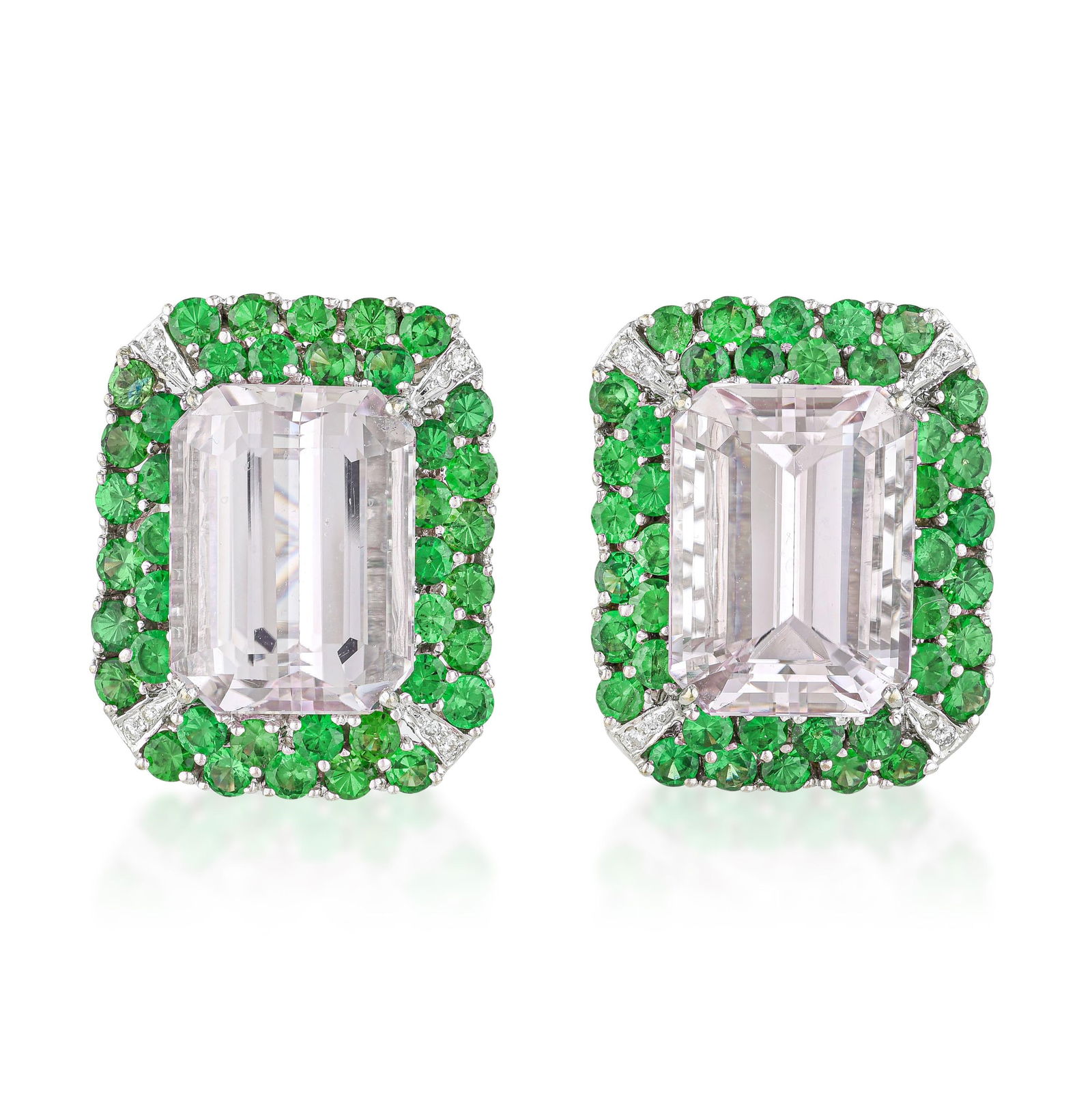 Kunzite and Tsavorite Earrings: ESTIMATED RETAIL PRICE: $11,000* *This is the estimated value a piece of similar quality, craftsmanship, and characteristics could command at retail. Kunzite and tsavorite earrings in 18K