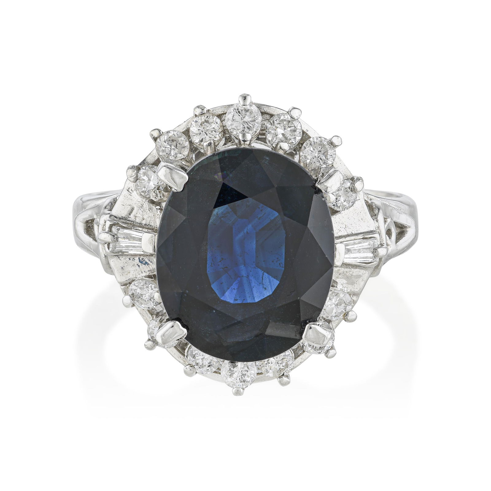 Sapphire and Diamond Ring: ESTIMATED RETAIL PRICE: $2,800* *This is the estimated value a piece of similar quality, craftsmanship, and characteristics could command at retail. A 3.60-carat oval sapphire in platinum with
