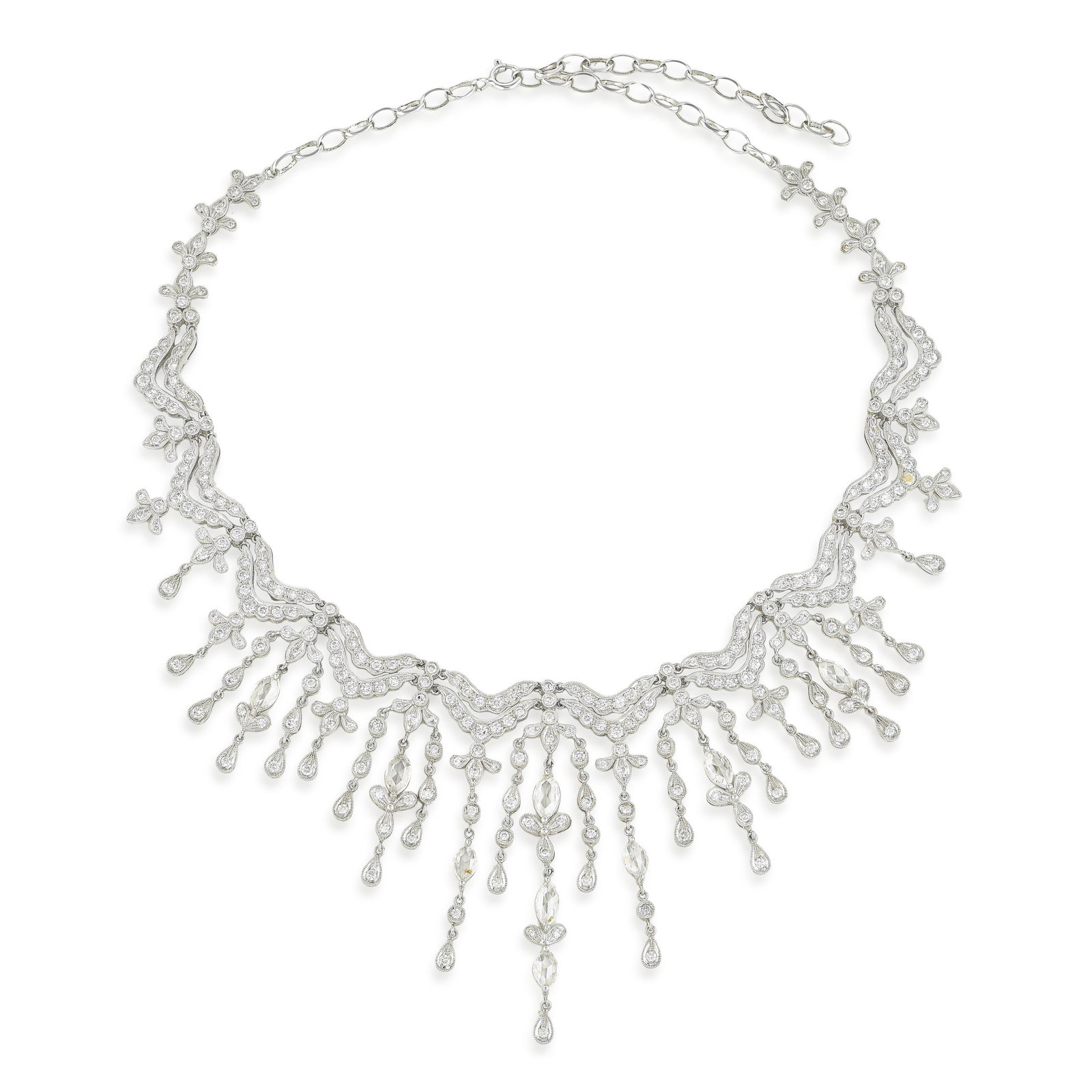 Diamond Collar Necklace: ESTIMATED RETAIL PRICE: $32,000* *This is the estimated value a piece of similar quality, craftsmanship, and characteristics could command at retail. Eleven carats of mixed-cut diamonds on an