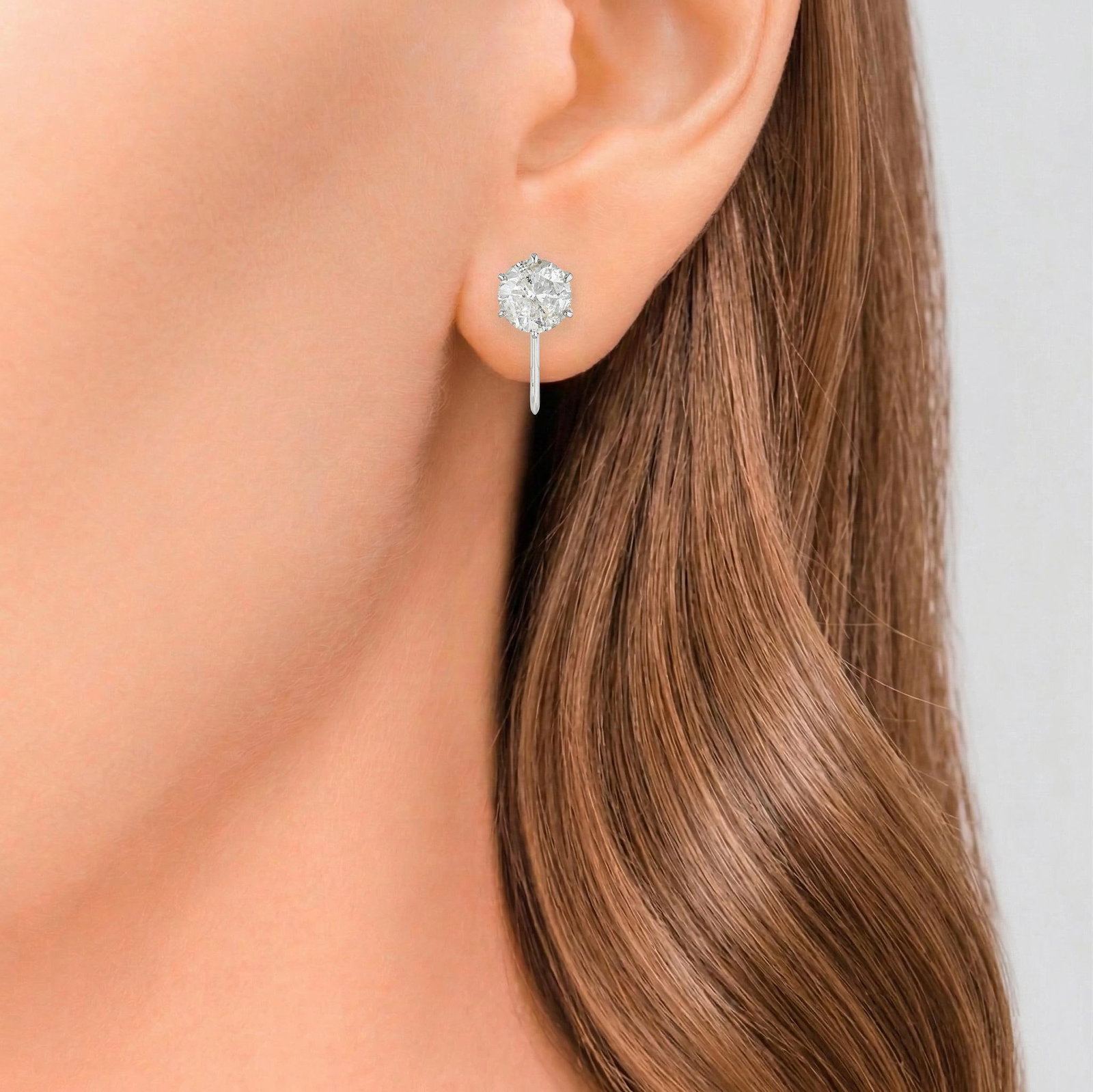Diamond Earrings: ESTIMATED RETAIL PRICE: $2,400* *This is the estimated value a piece of similar quality, craftsmanship, and characteristics could command at retail. Platinum diamond earrings of this proportion